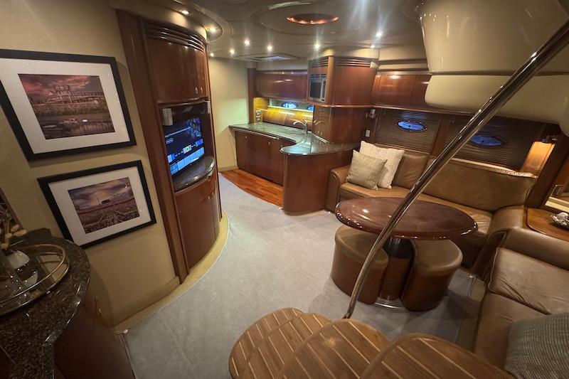Luxurious interior of 2005 Sea Ray 500 Sundancer yacht with elegant wood finishes.