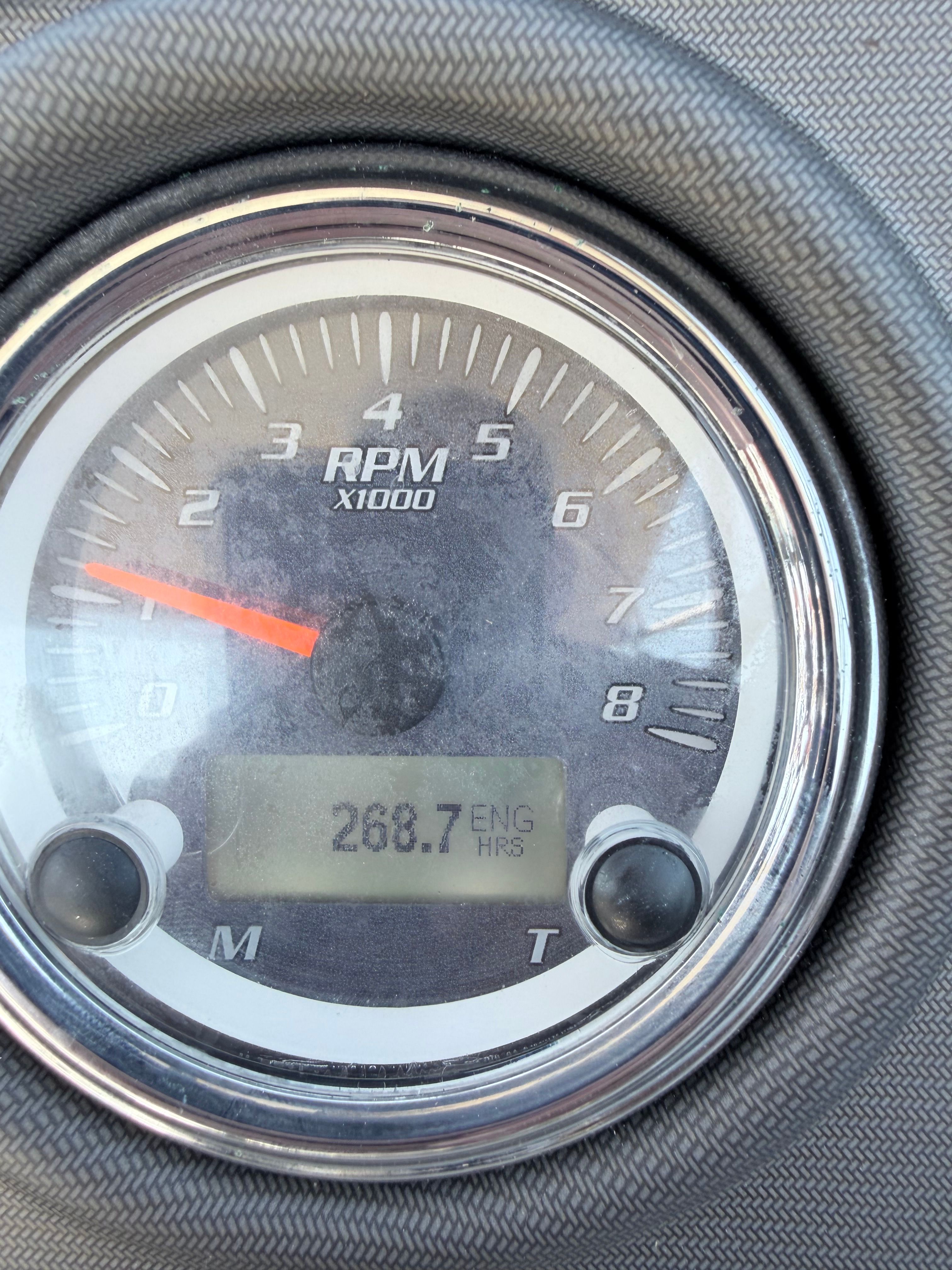Close-up of a tachometer showing 268.7 engine hours on a Yamaha boat.