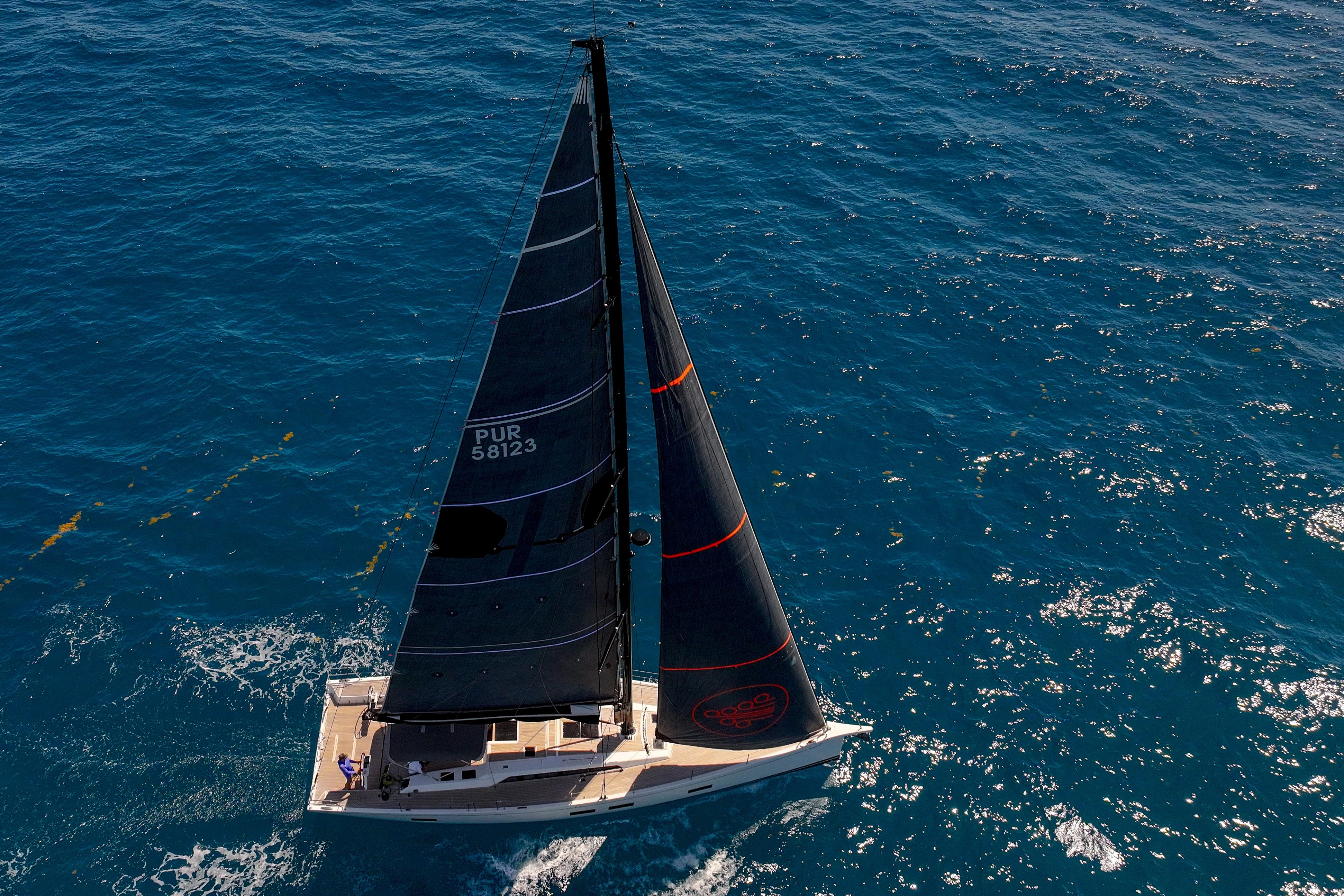 Aerial view of 2016 Grand Soleil 58 sailing yacht on open sea.