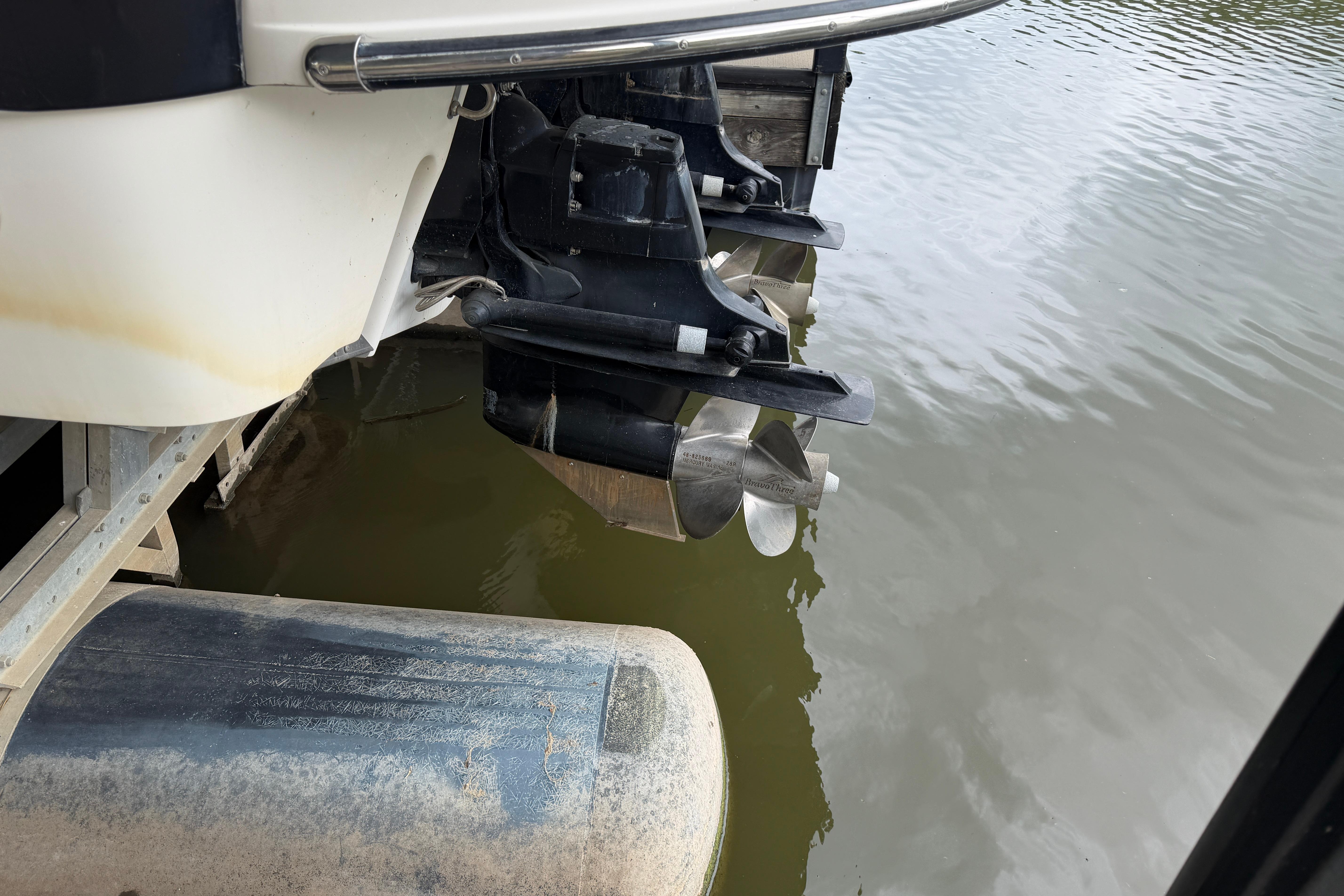 Rear view of a 2007 Monterey 298SSX Super Sport boat with dual propellers.