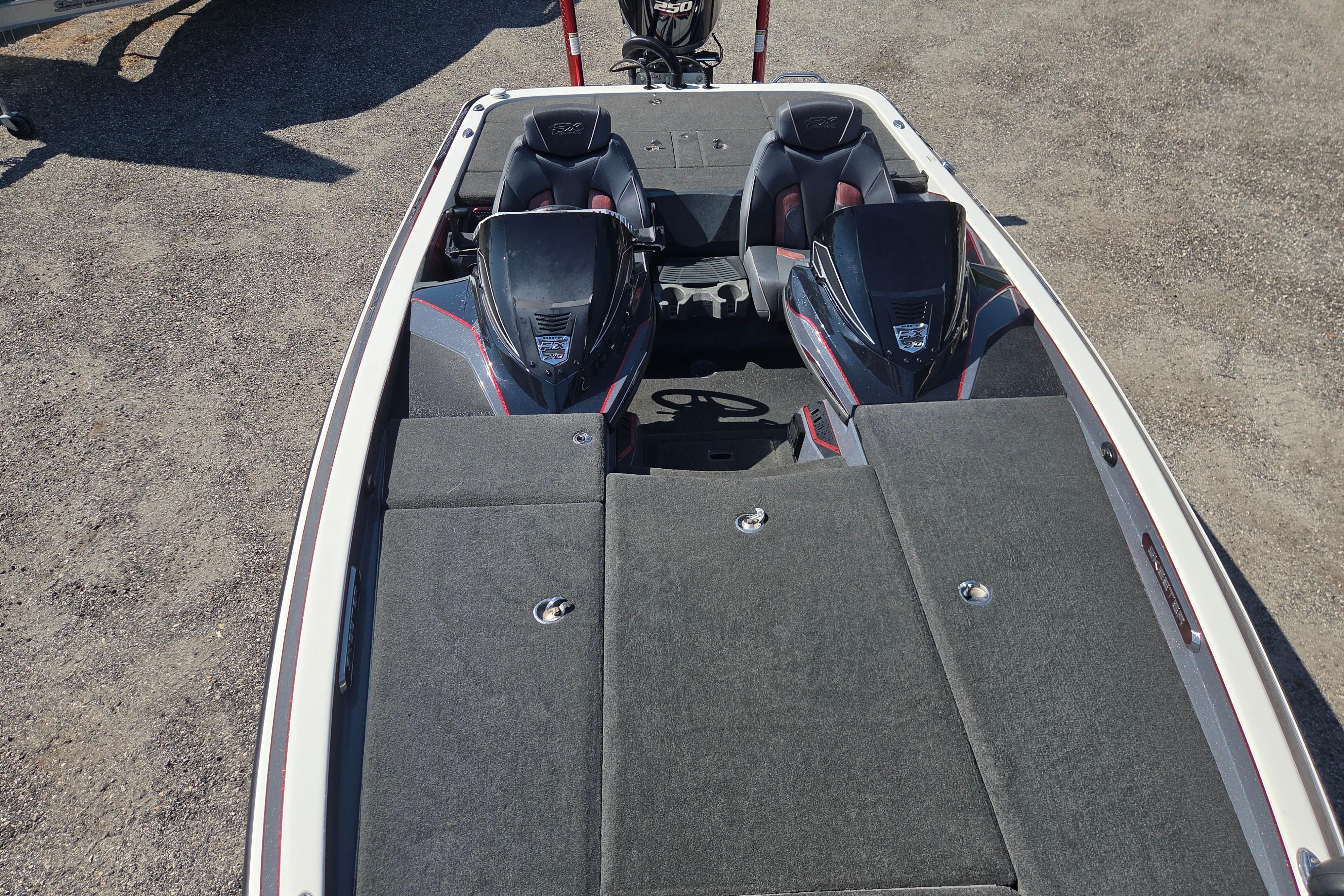 2019 Skeeter FX21 Apex boat interior with dual seats and storage compartments.