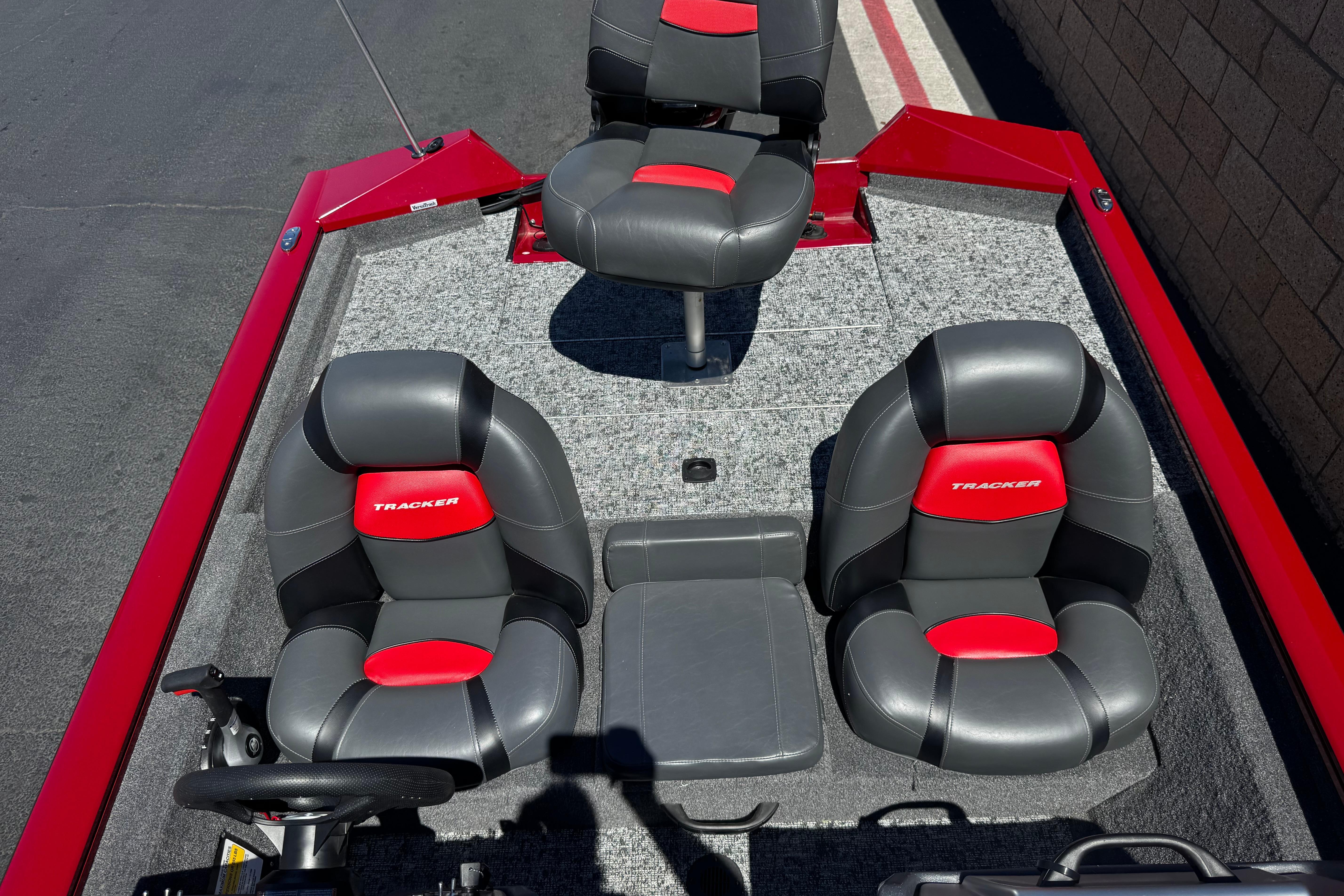 2025 Tracker Pro Team 175 TXW boat interior with red and black seating.