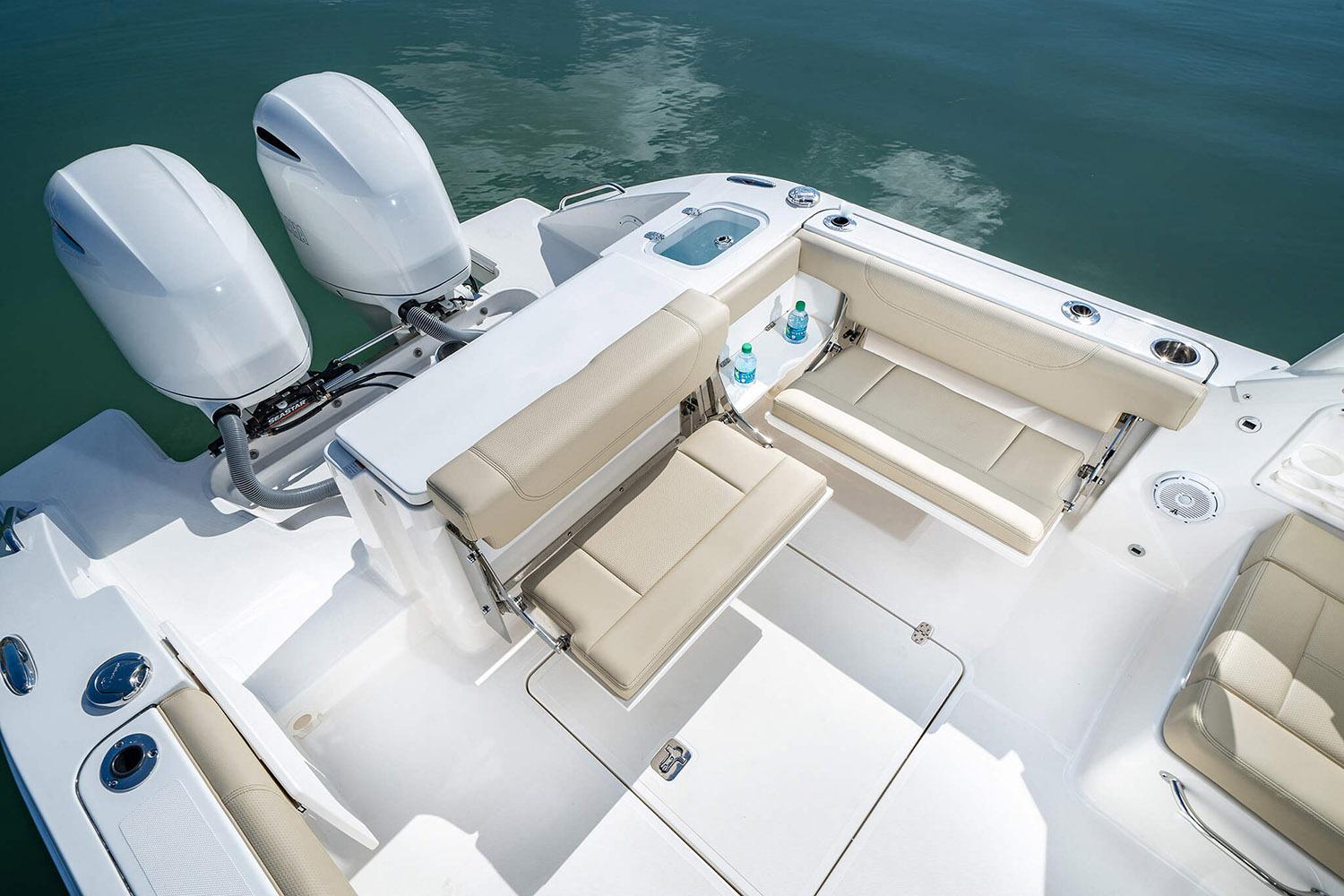 Manufacturer Provided Image: 2025 Pursuit DC 266 Dual Console boat interior with seating and twin engines.