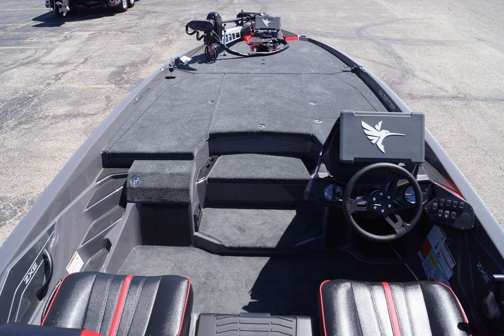 2026 Skeeter ZXE21 boat interior with steering wheel and control panel.