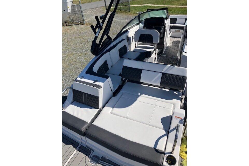 2024 Monterey M-65 boat interior with luxurious seating and modern design.