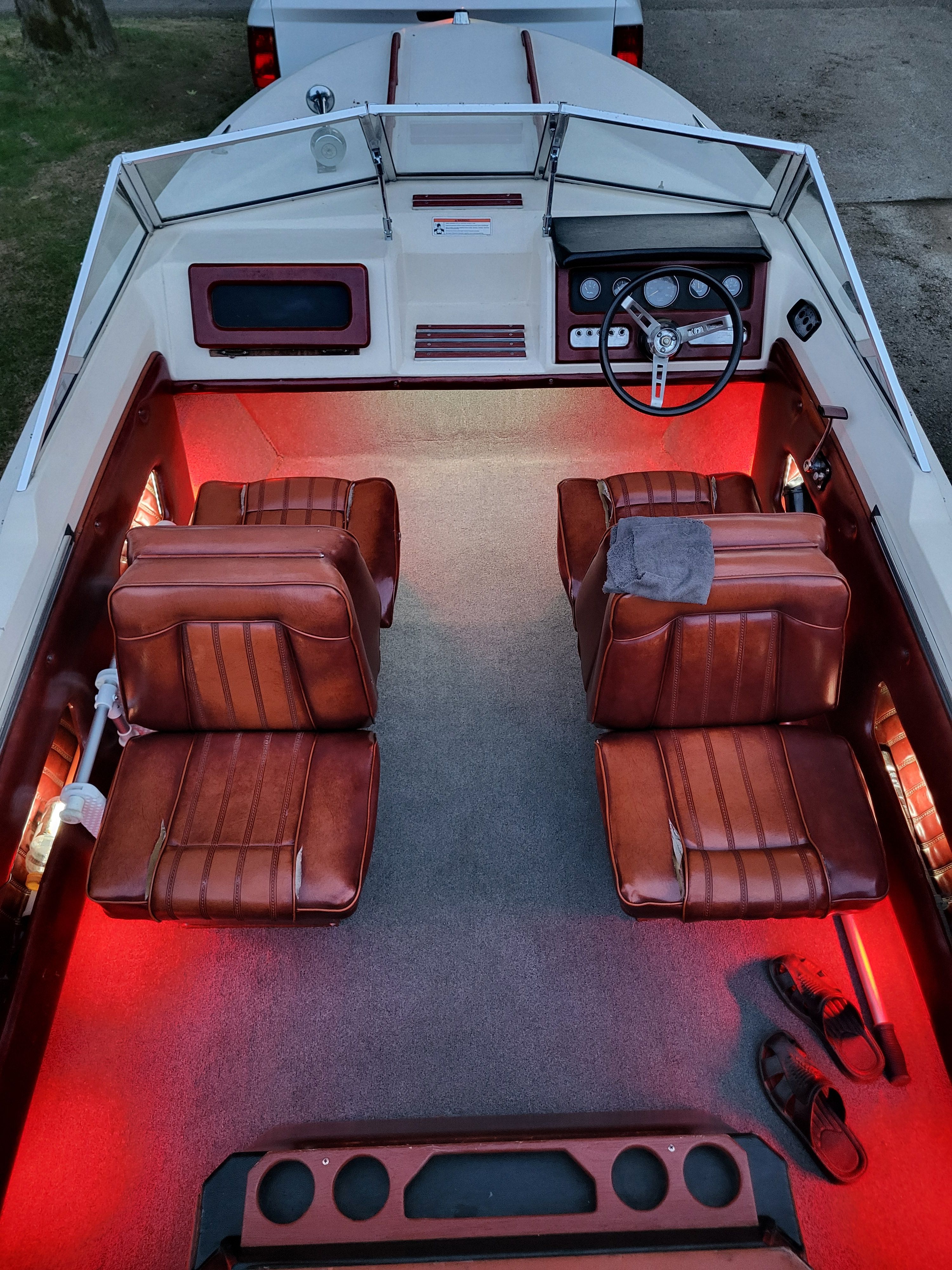 Interior of a 1977 Bayliner Jamaica with red lighting.