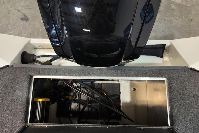2024 Lowe Stinger 188 boat interior showing engine compartment and equipment.