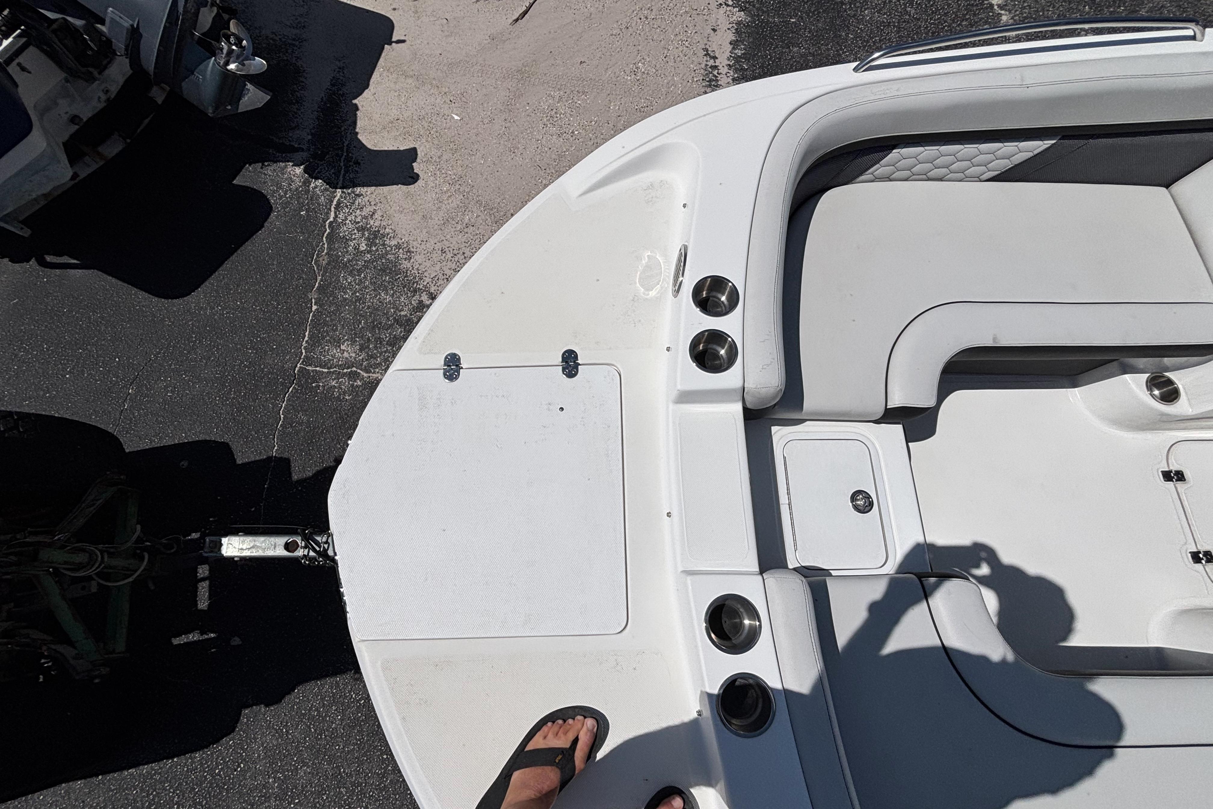 2019 Hurricane Sundeck Sport 218 OB boat interior with seating and cup holders.