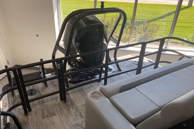 2026 Bentley Pontoons Legacy 243 Swingback interior with seating and railing, showcasing modern design.