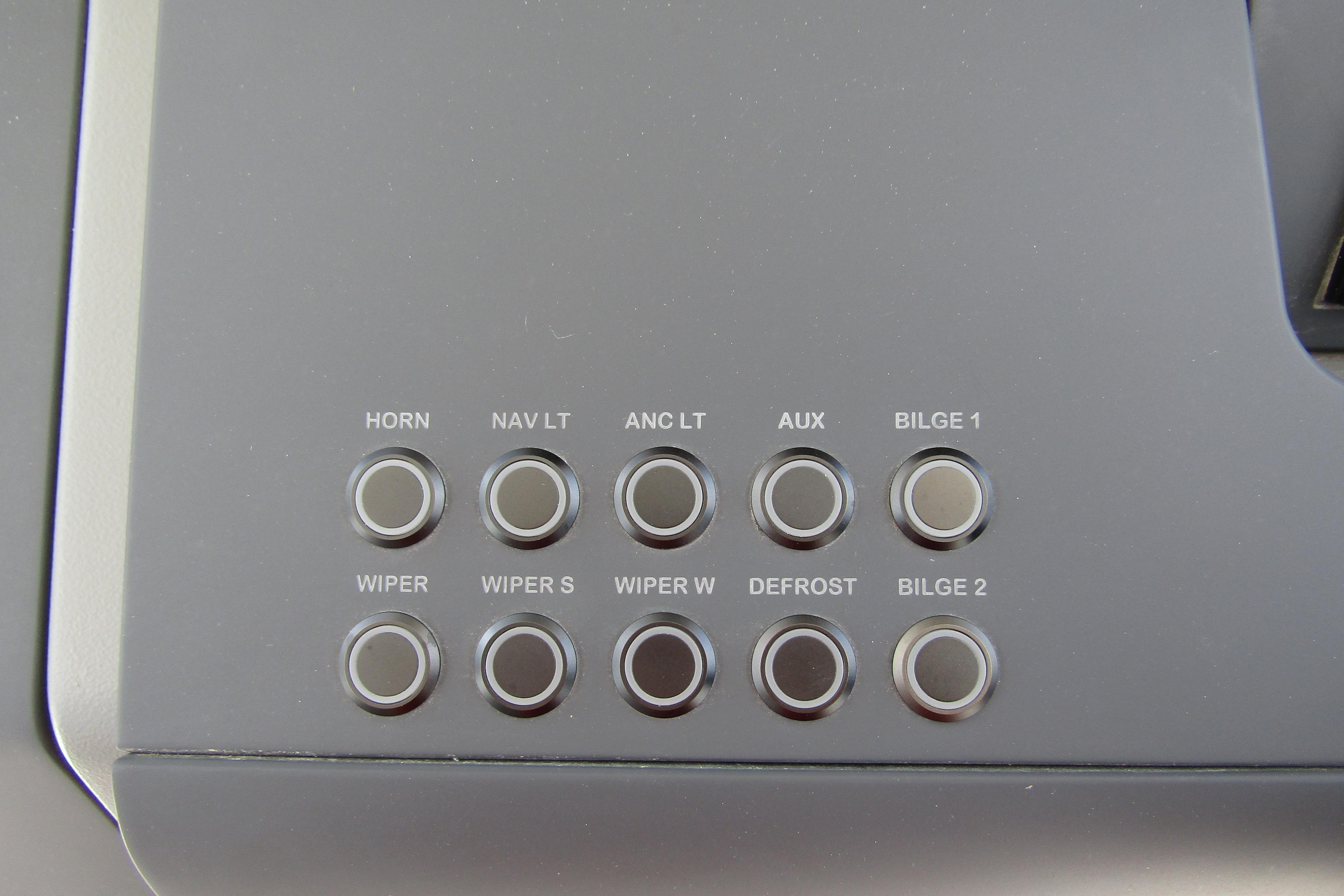 Control panel of 2025 Nimbus Tender 11 with labeled buttons for various functions.