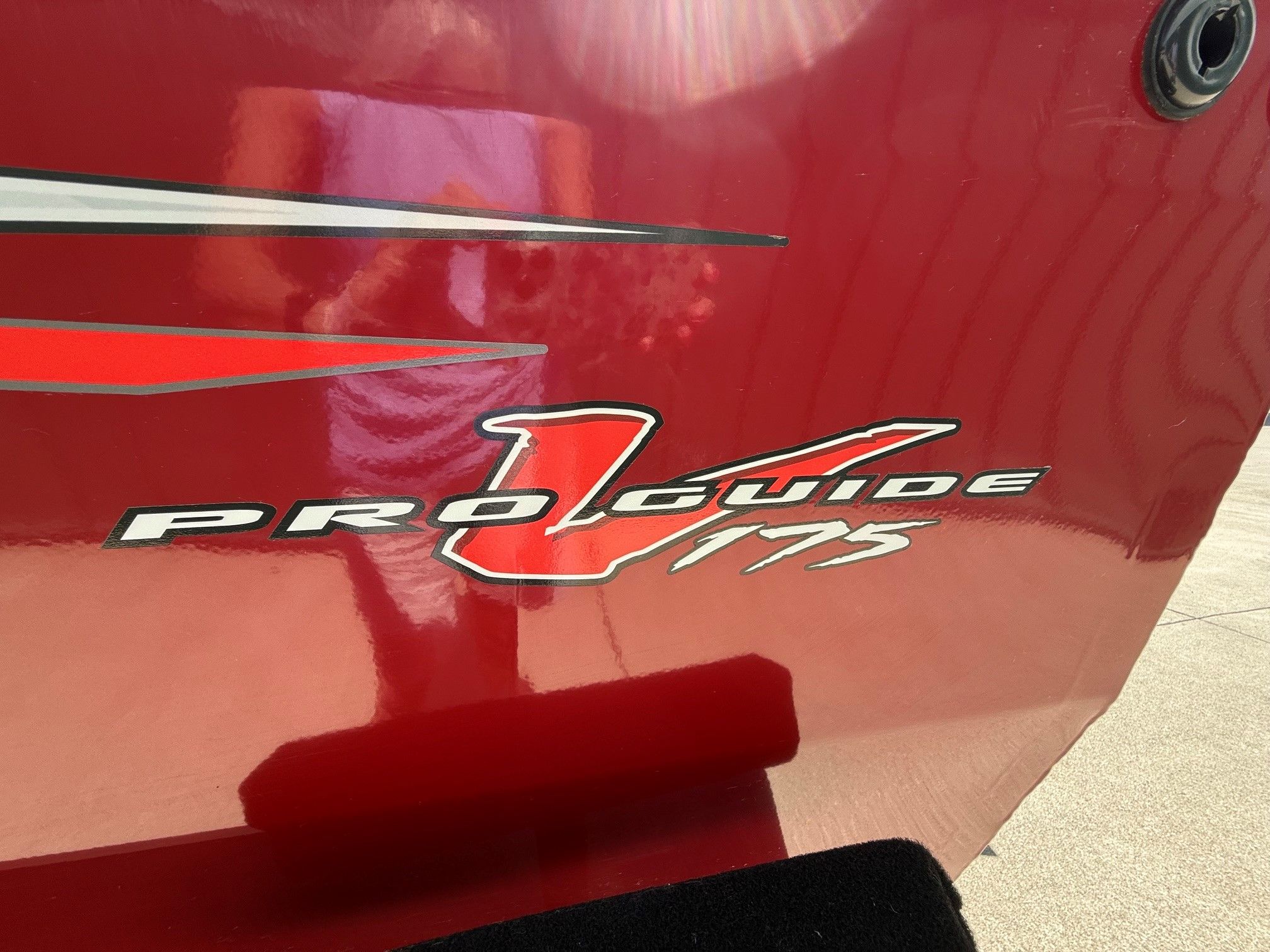 Red Tracker Pro Guide V175 boat, model year 2024.