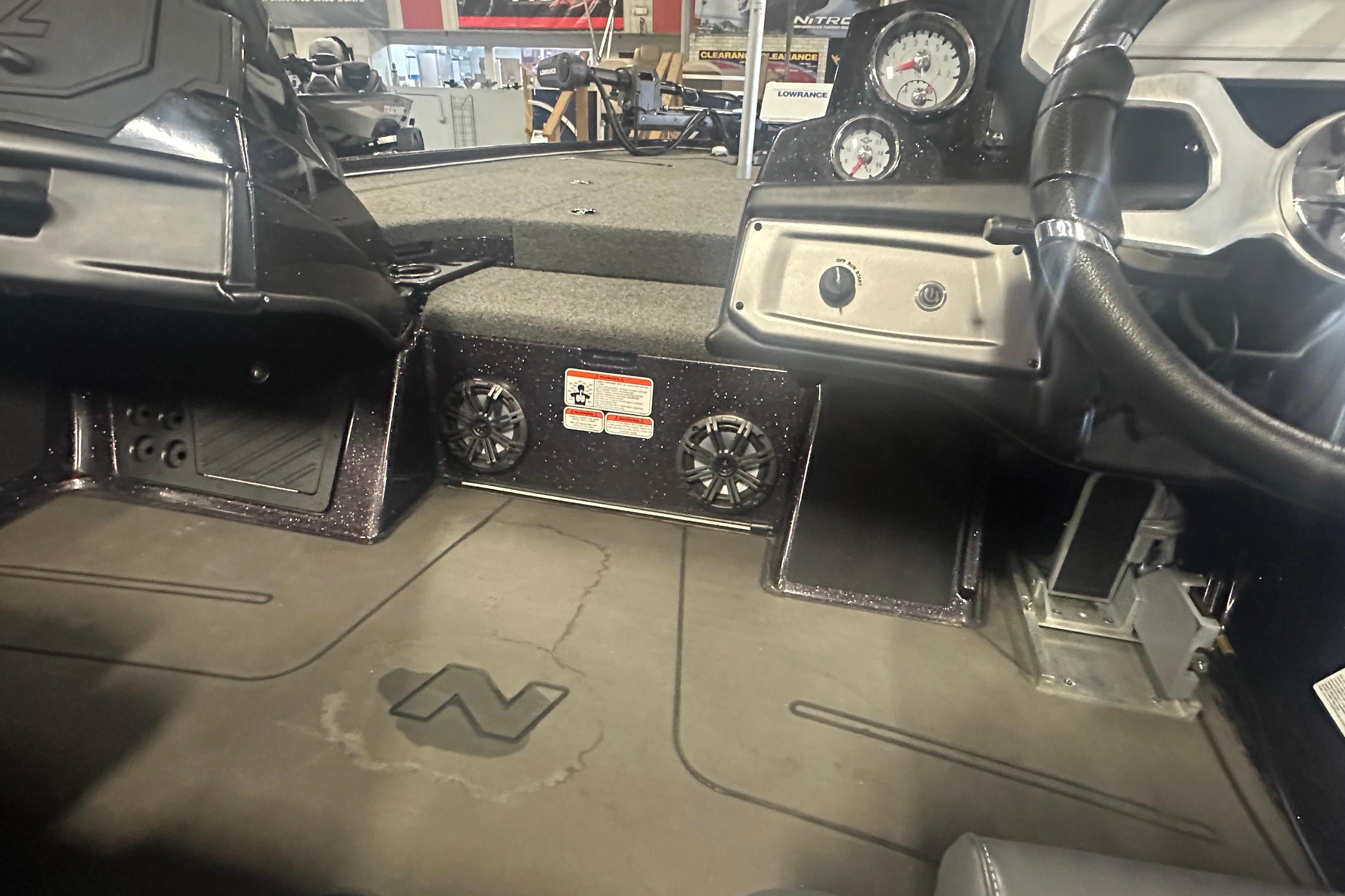 Interior of a 2022 Nitro Z20 Pro boat, featuring dashboard and steering wheel.