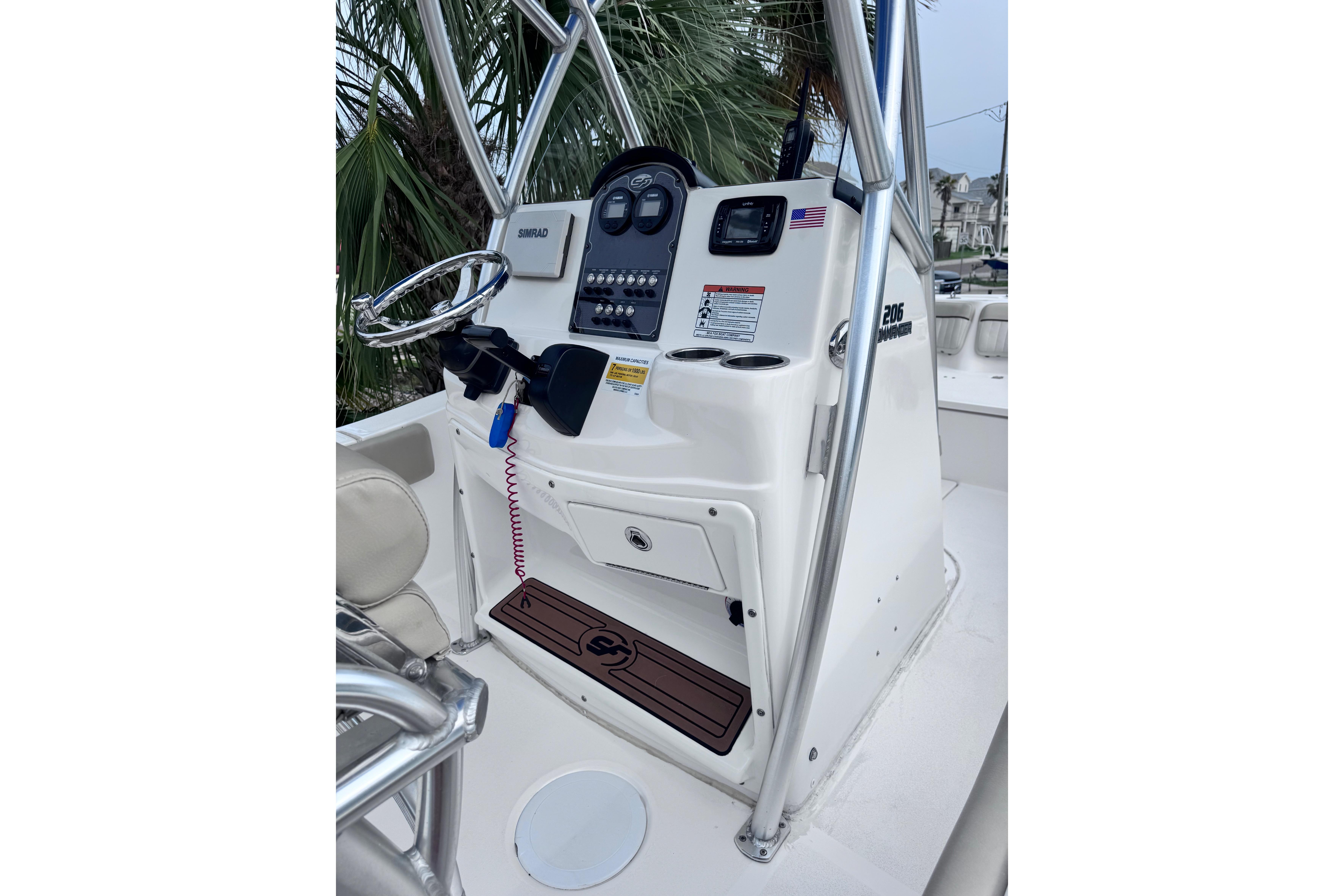 2018 Sea Fox 206 Commander boat console with steering wheel and controls.