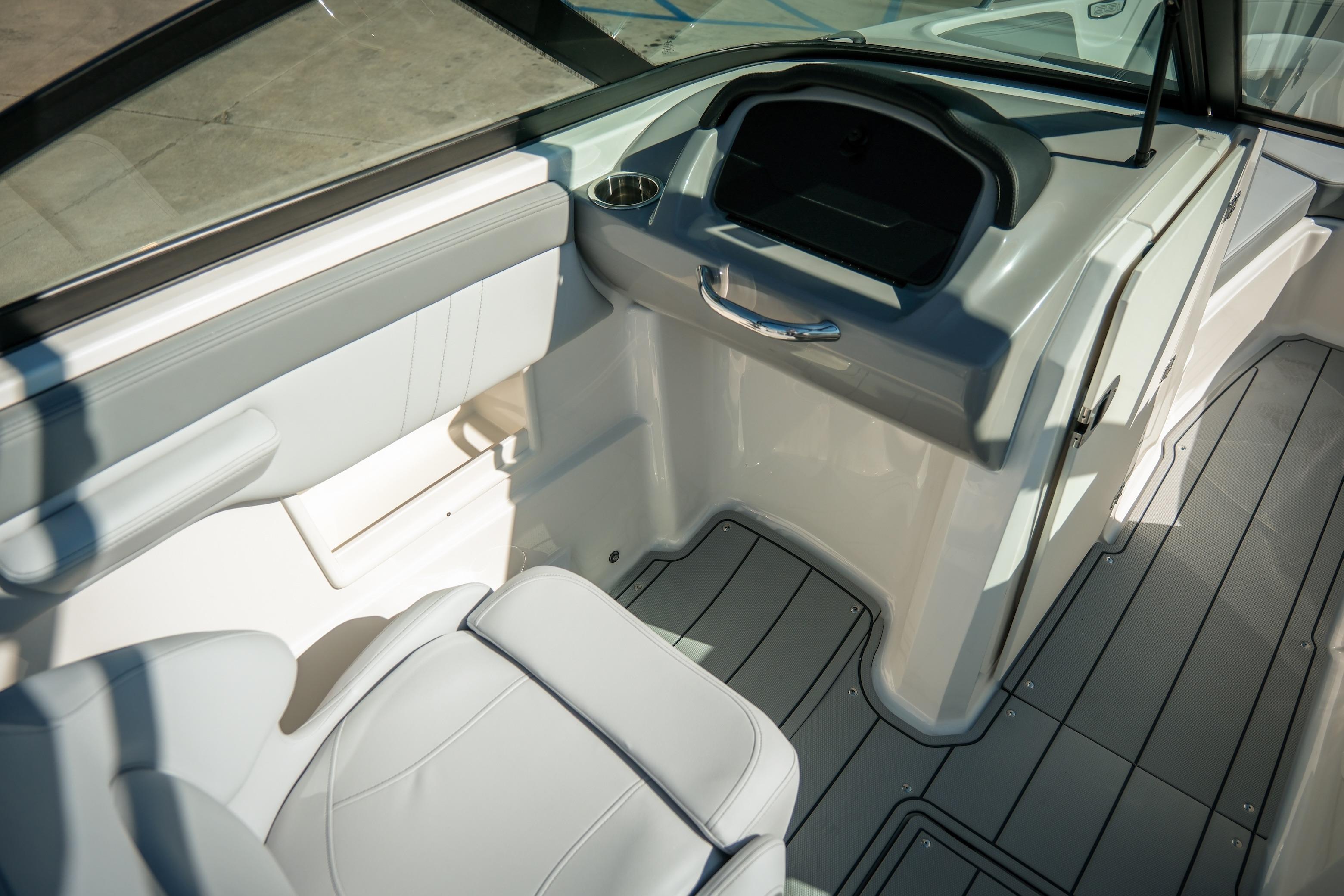 Interior view of 2026 Chaparral 23 SSi boat, featuring sleek seating and modern design.