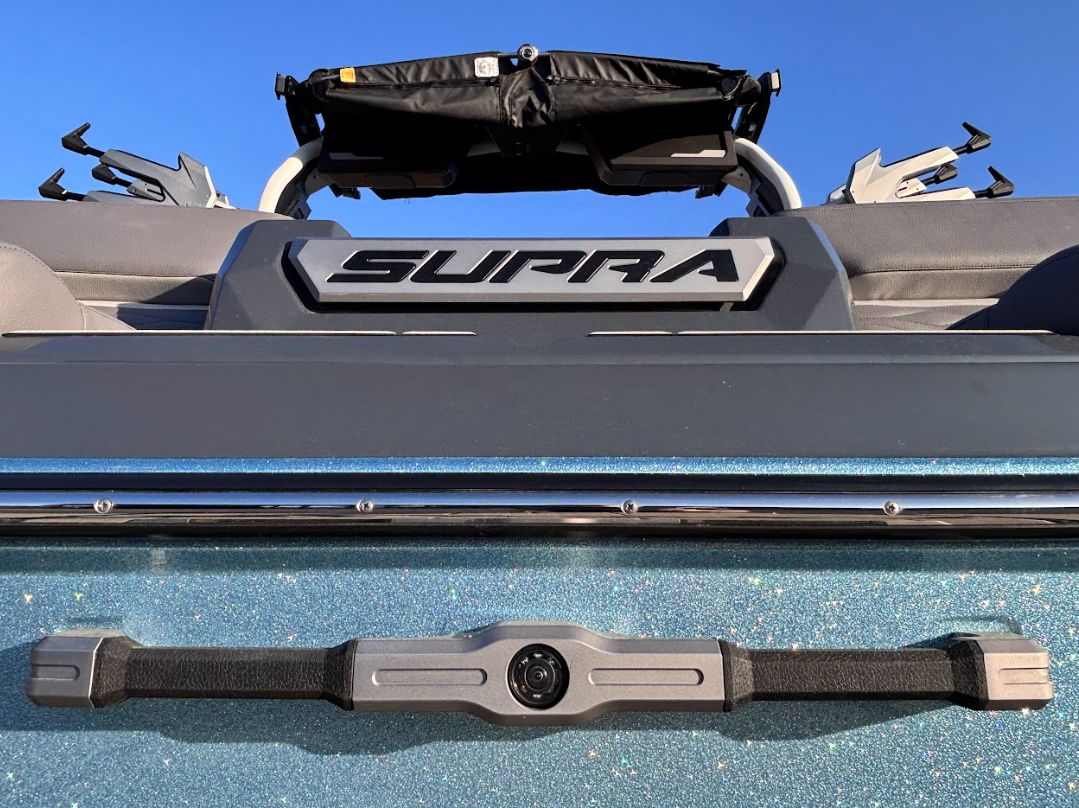 2025 Supra SA 450 boat with sparkling blue finish.