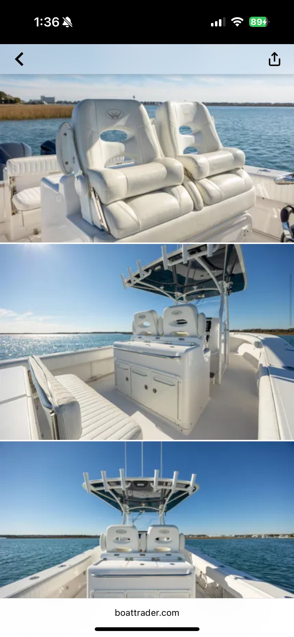 2014 Southport 29 Center Console on calm water with clear view of cockpit and seating.