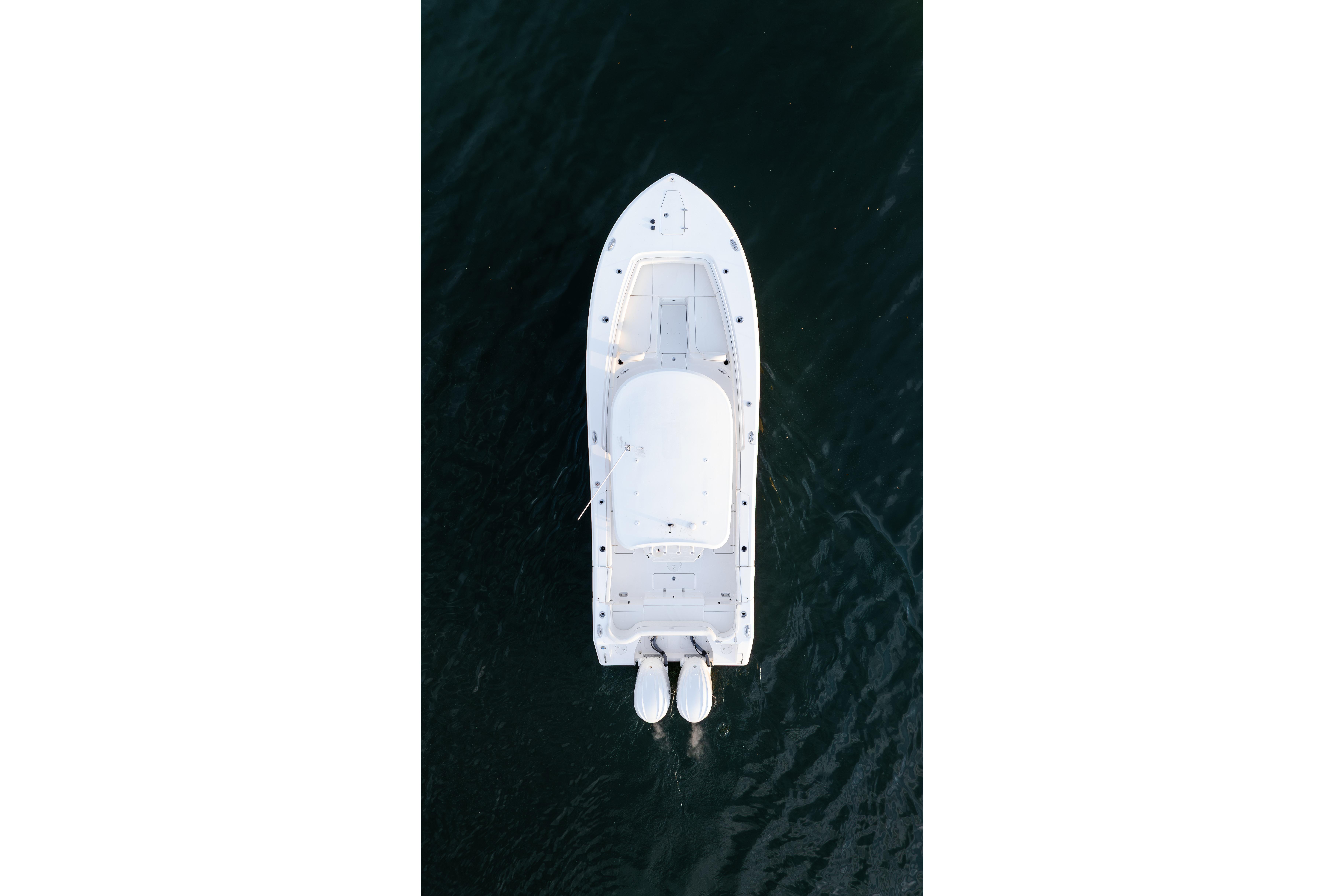 Aerial view of 2027 Sea Hunt Ultra 275 SE boat on water.