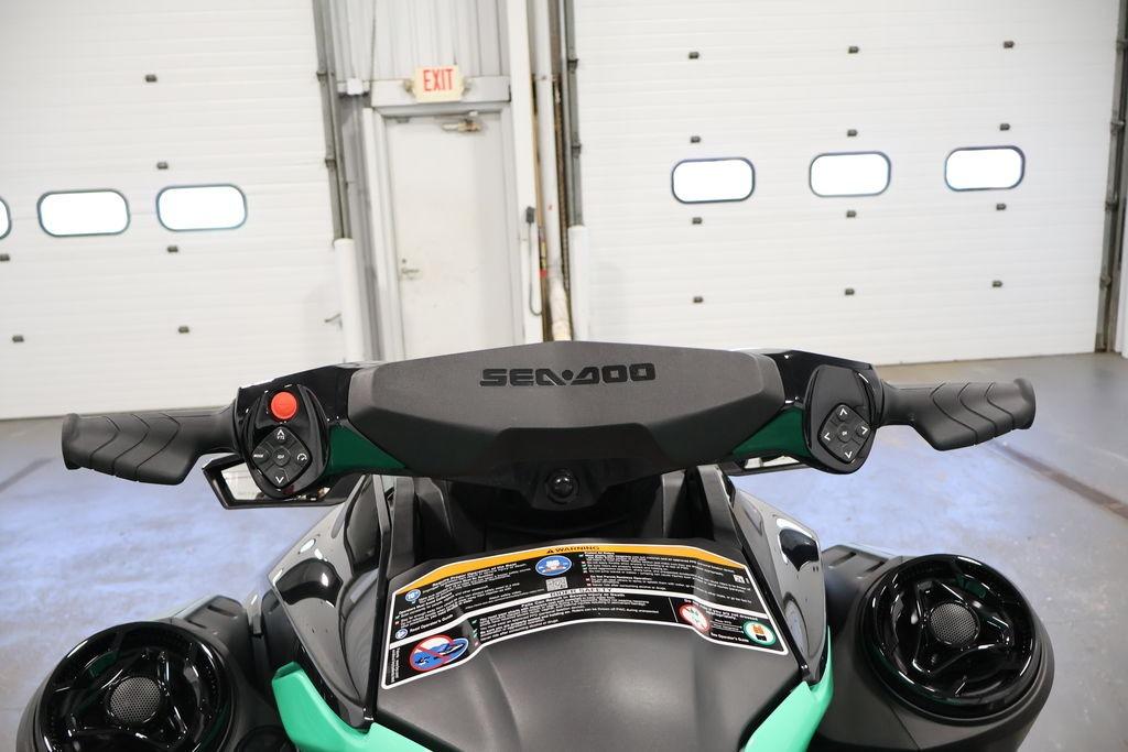2026 Sea-Doo GTI SE 130 handlebars in a garage setting.