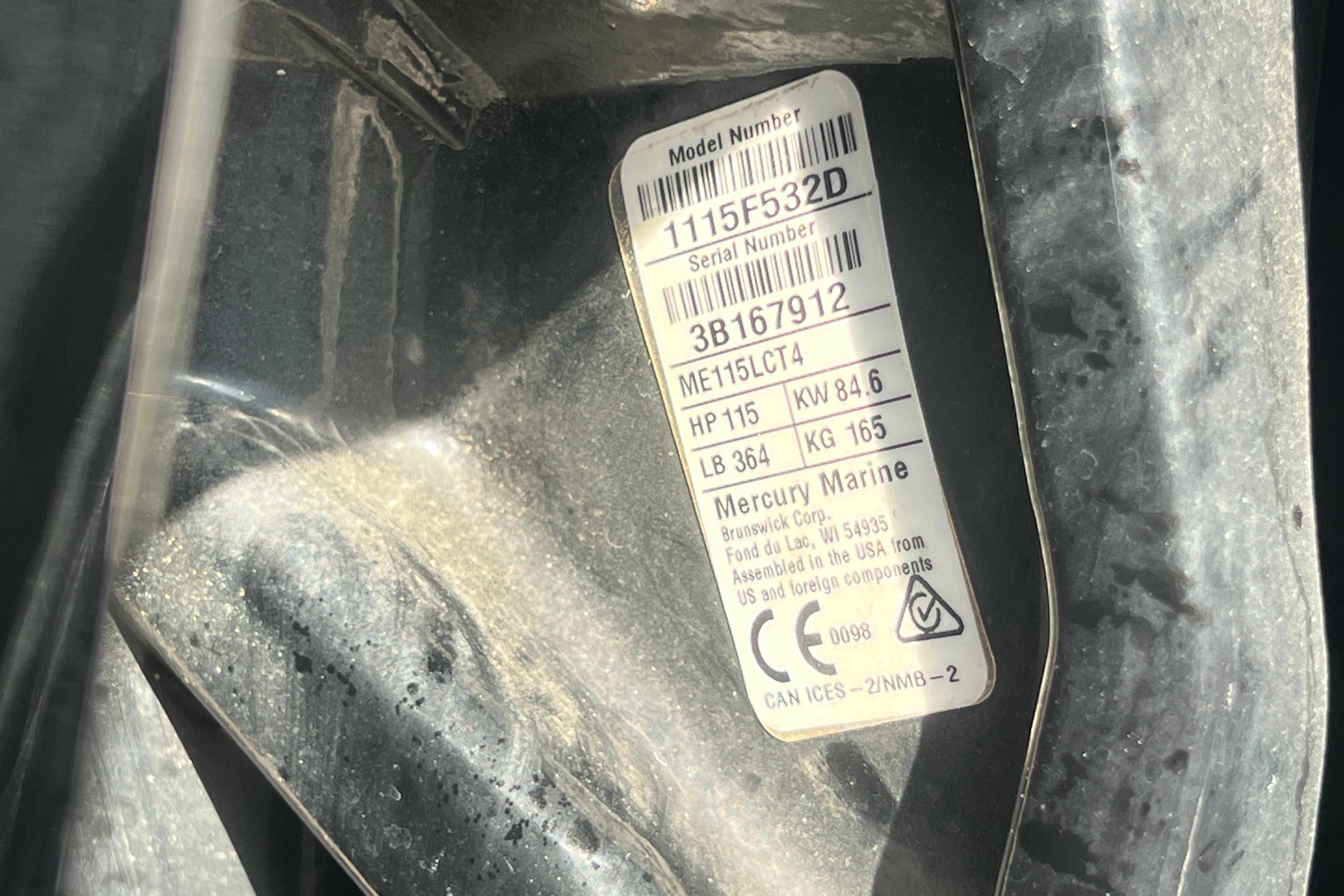 Label on Mercury Marine engine, model ME115LCT4, showing specifications and compliance details.