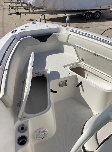 2022 Sailfish 220 CC boat interior with open storage compartments.