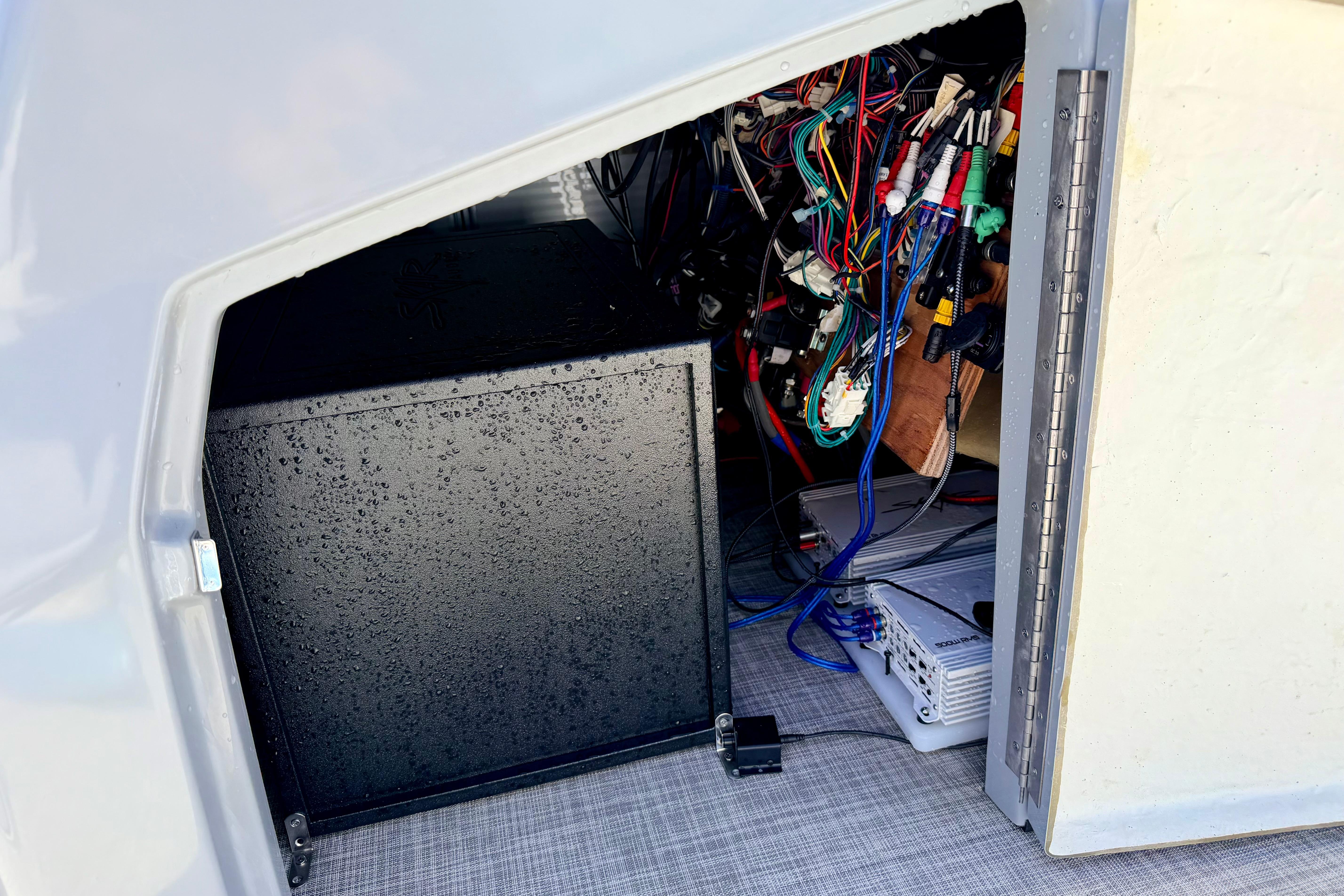 Interior view of a 2019 Crestliner 240 Rally DX CW boat showing wiring and equipment.