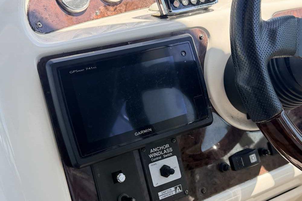 Dashboard of a 2001 Monterey 282 Cruiser featuring a Garmin GPSMAP 741xs.