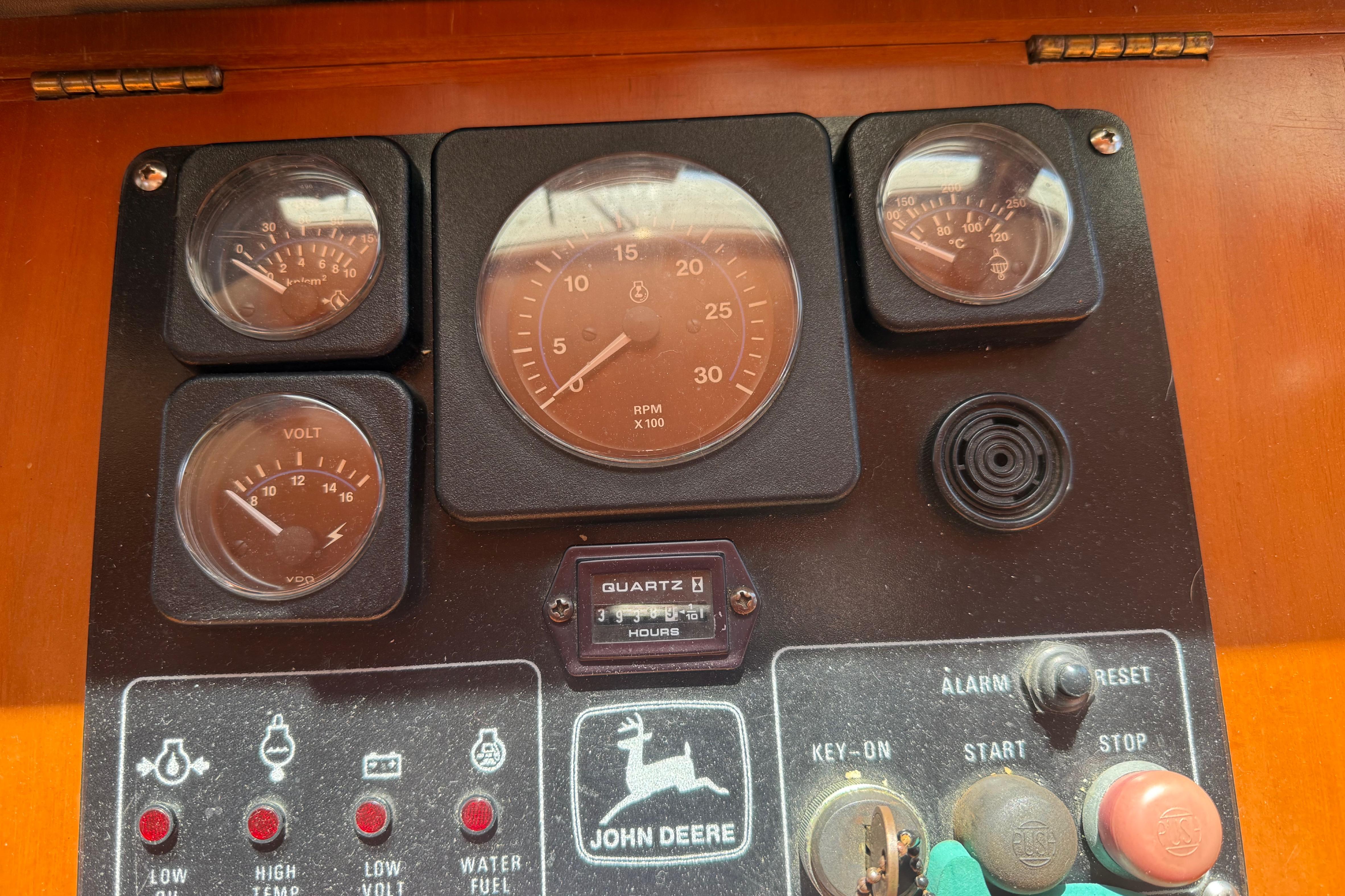 Instrument panel of a 2001 Kadey-Krogen 39 boat with gauges and controls.