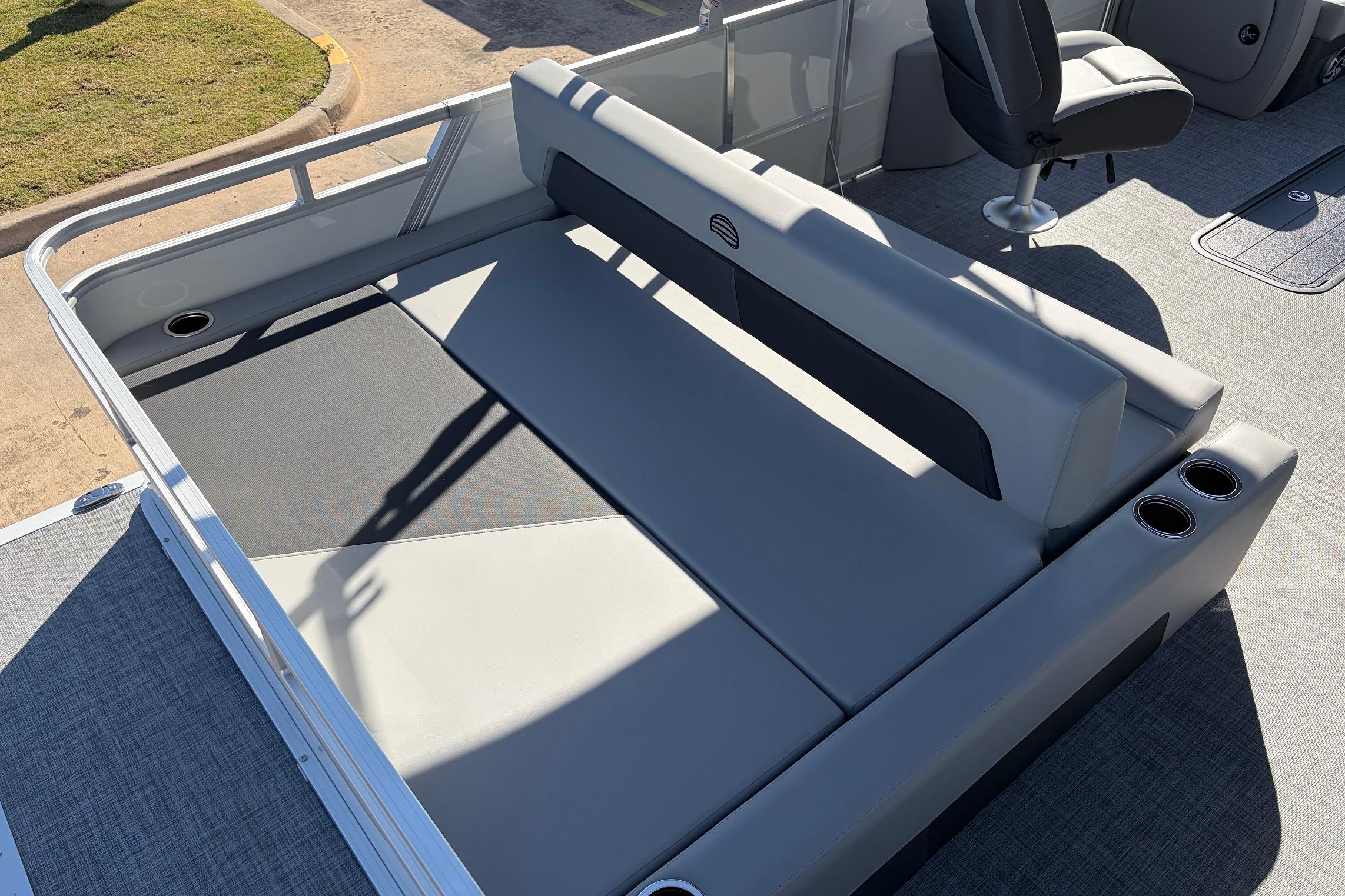 2026 Sun Tracker Party Barge 22 RF XP3 with gray seating and cup holders.