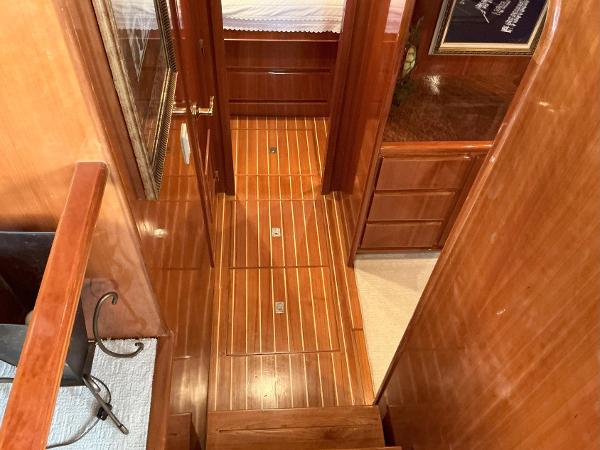 Luxurious wooden interior of 2000 Novatec Islander 55 yacht cabin hallway.