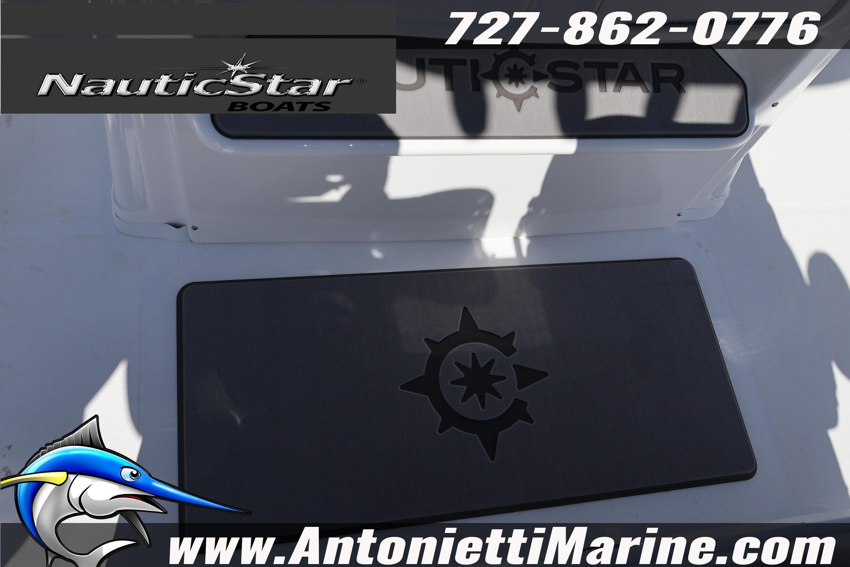 2026 NauticStar 292 Legacy boat deck with logo and contact details.