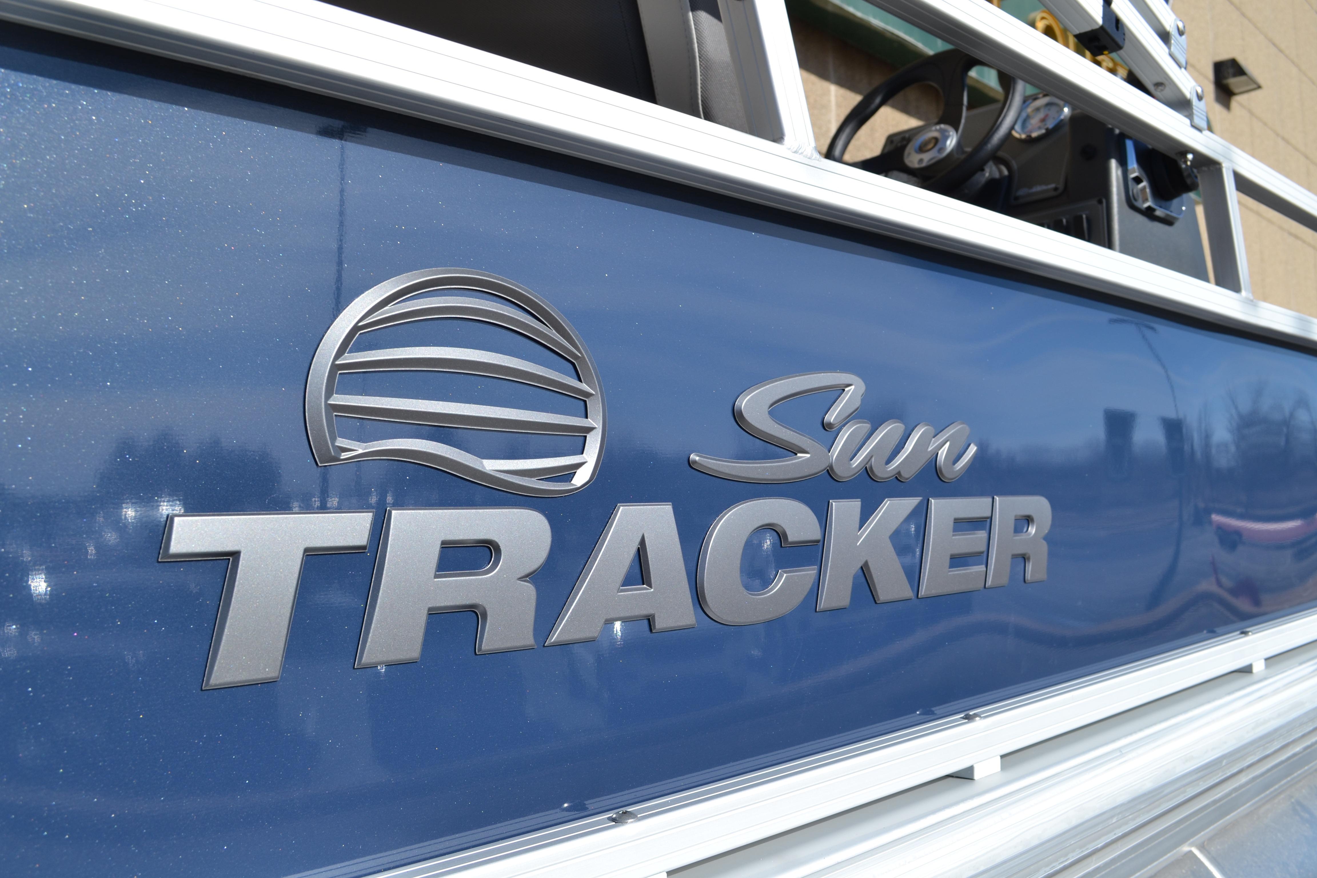 2026 Sun Tracker Bass Buggy 16 XL Select logo on blue boat exterior.