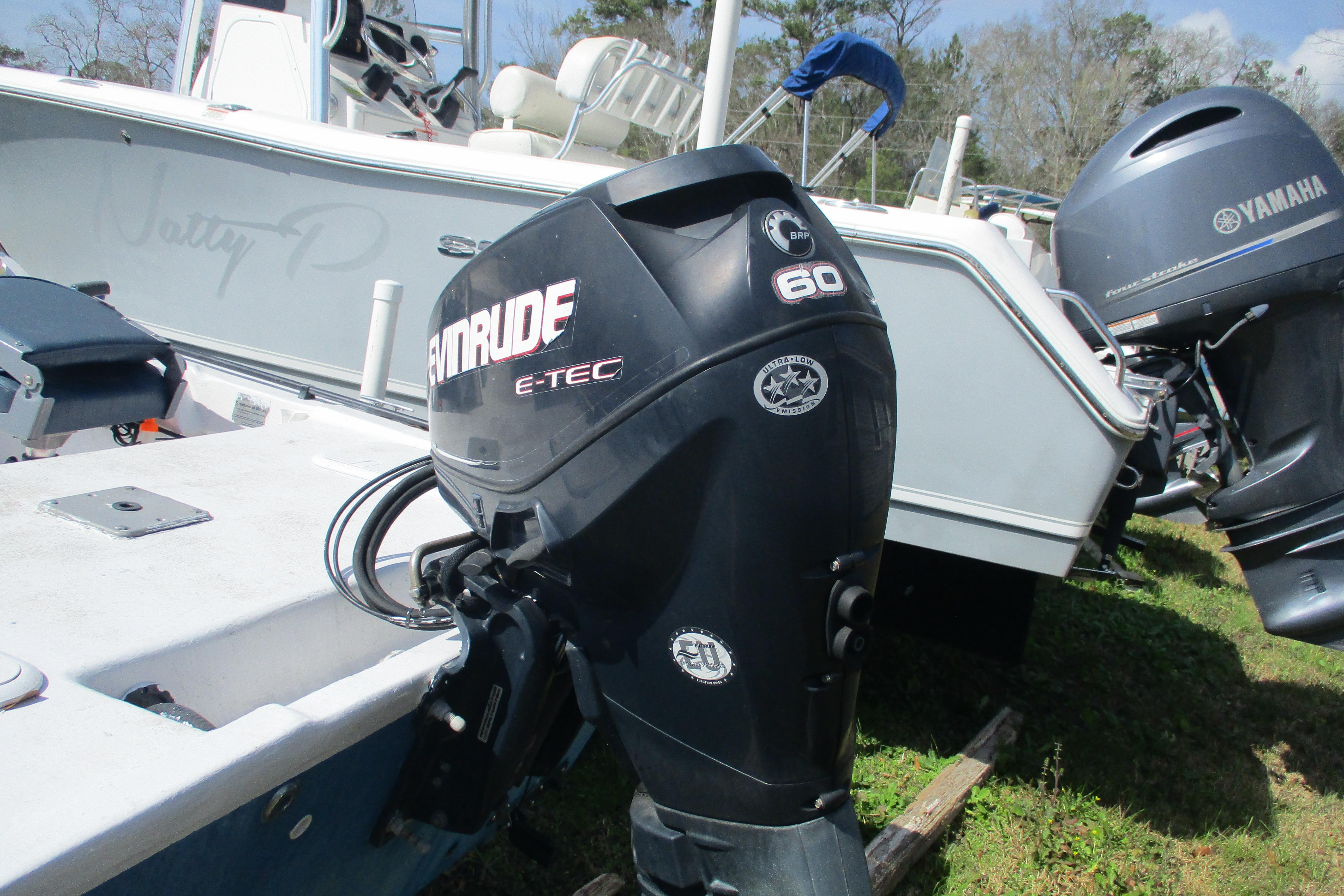 2012 Stumpknocker 17 SPORT boat with Evinrude E-TEC 60 outboard motor.