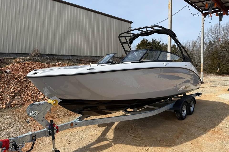 2026 Yamaha Boats AR250 on trailer, sleek design, parked outdoors.