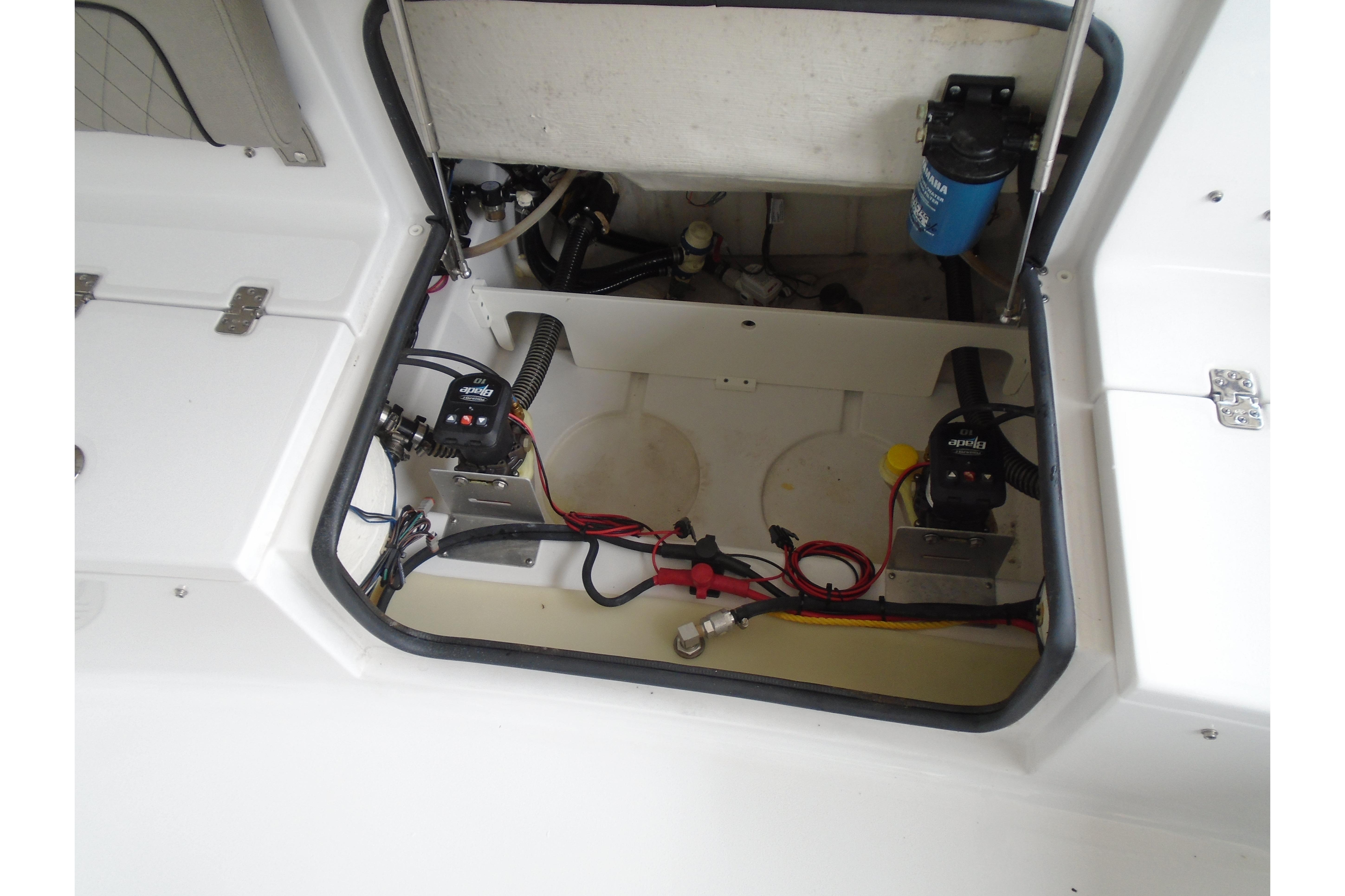 2022 Sportsman Heritage 241 Center Console boat interior wiring and components.