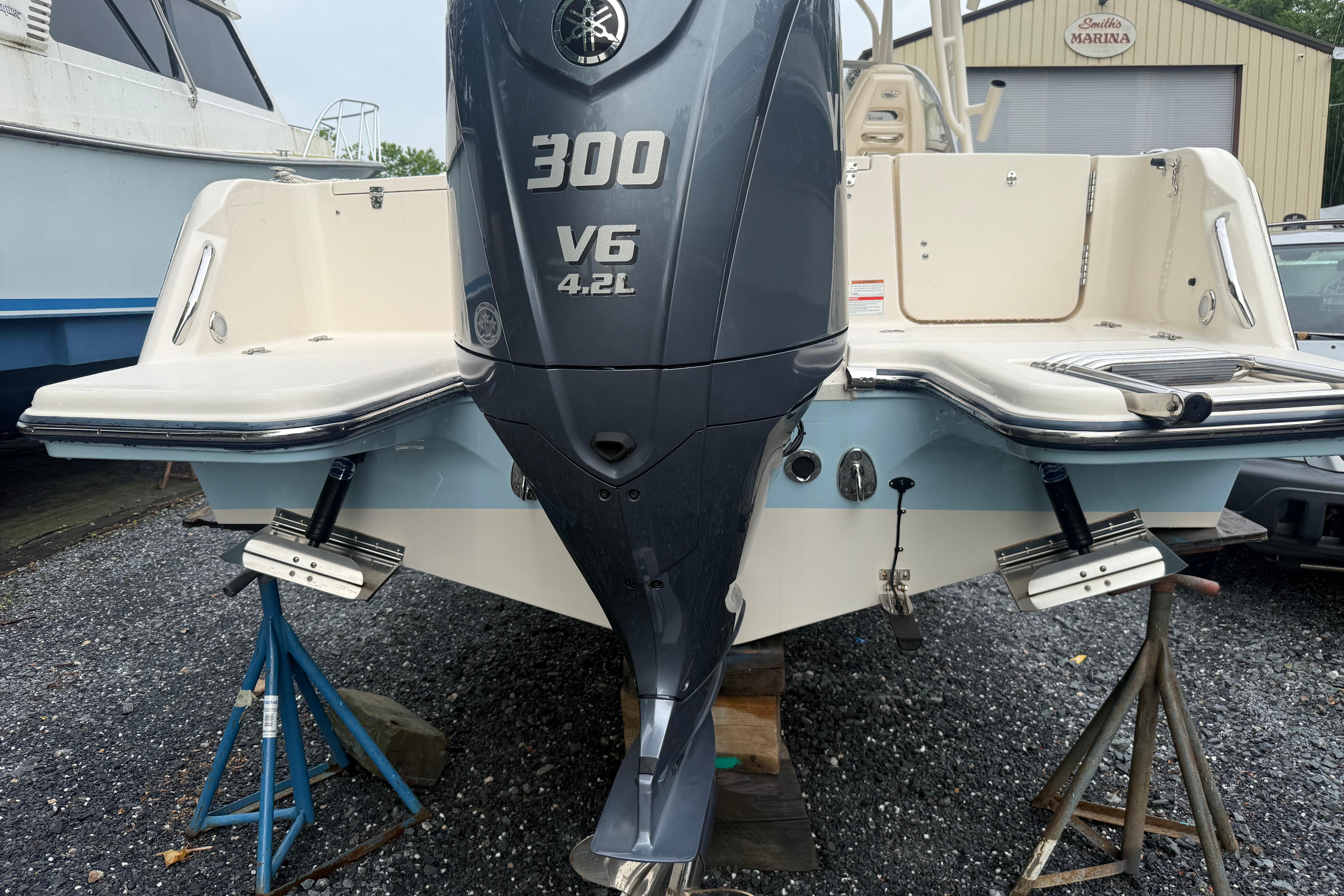2022 Grady-White Freedom 235 boat with Yamaha 300 V6 engine on stands.