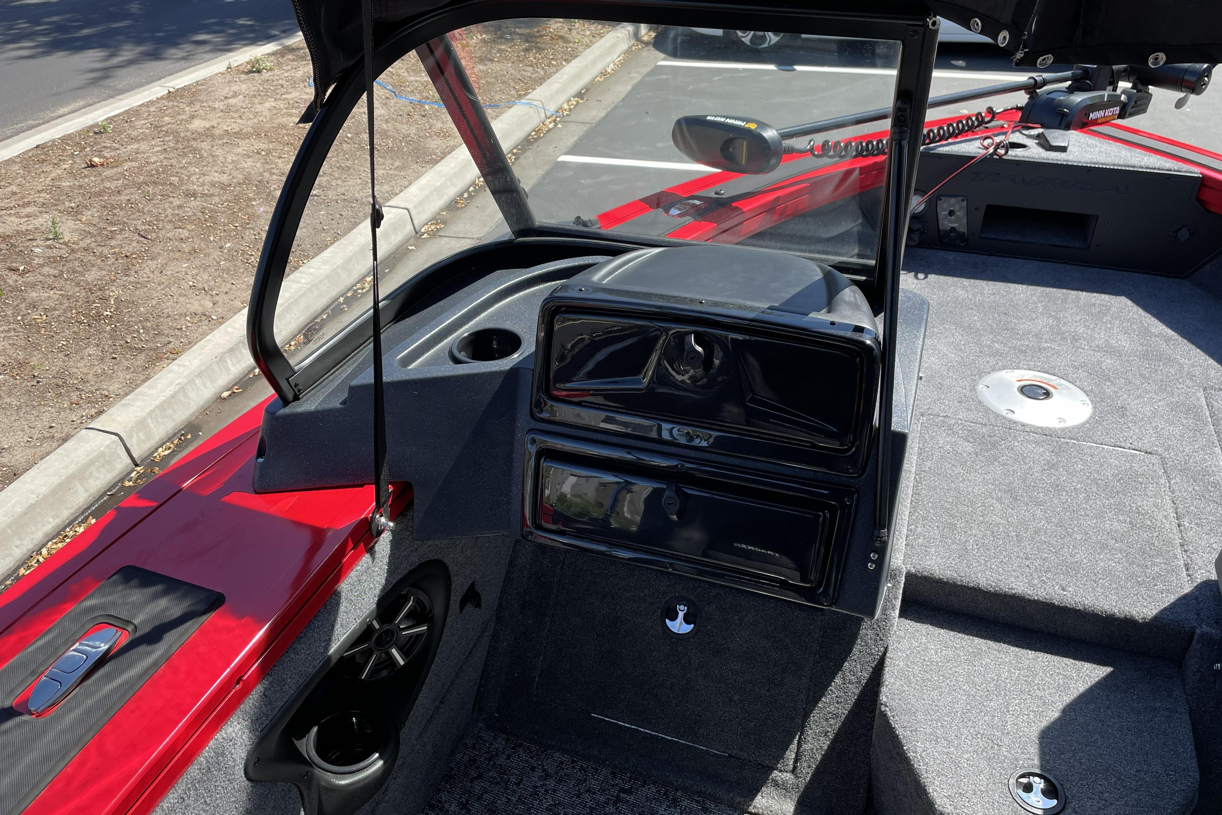 2026 Tracker Targa V-18 WT boat interior with red accents and modern dashboard design.