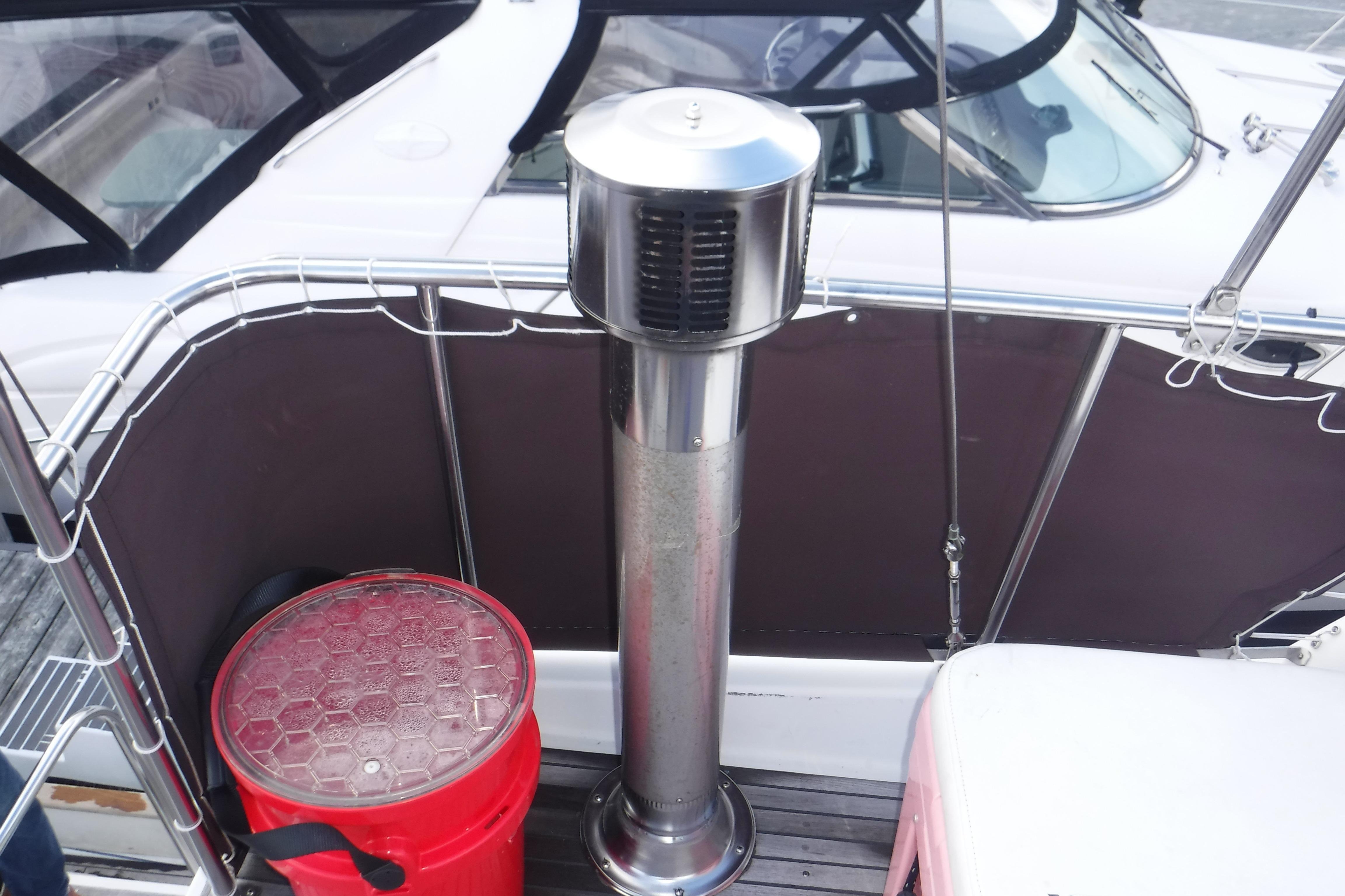 1988 Grand Banks 36 Classic boat deck with a red bucket and metal vent.