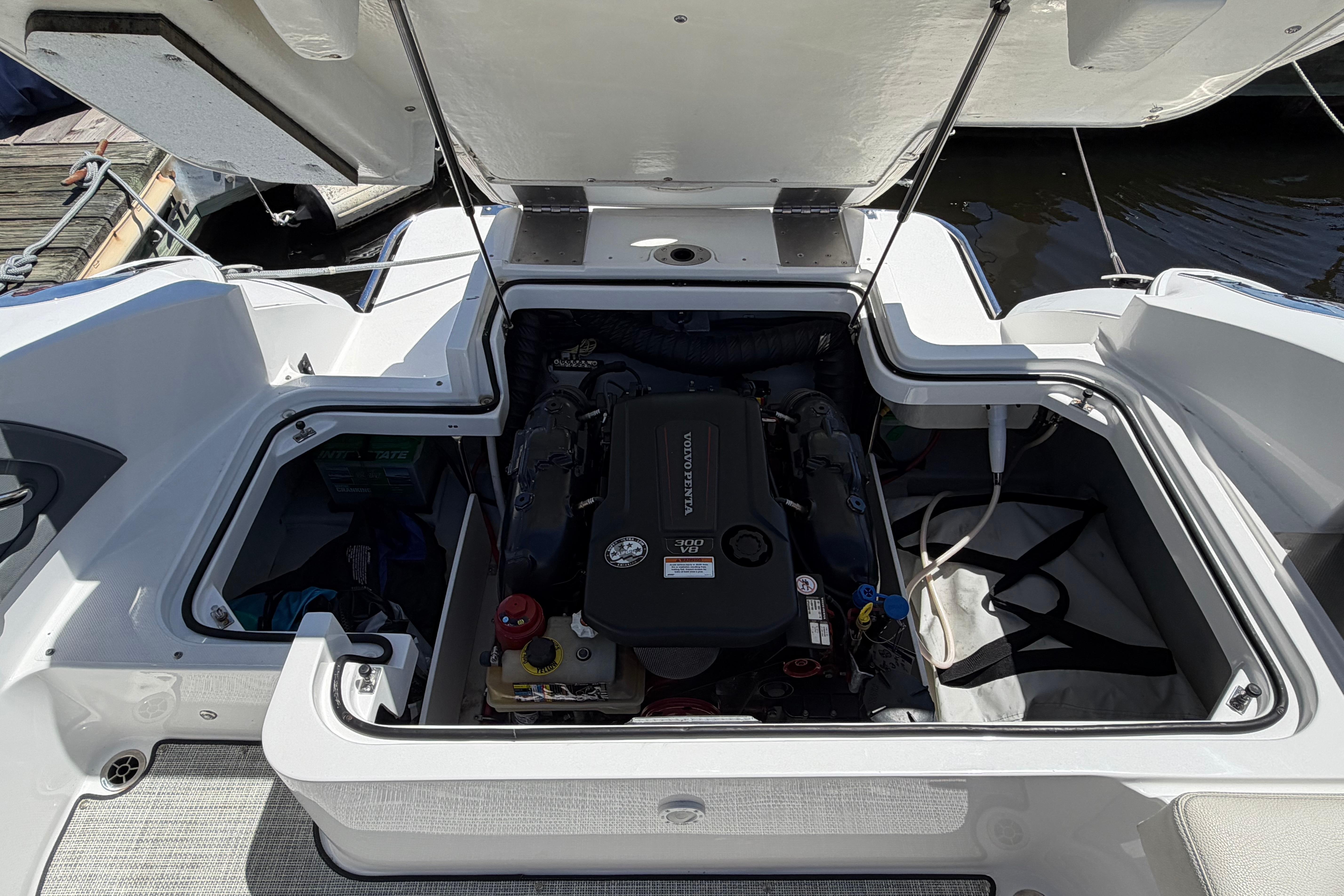 Open engine compartment of a 2020 Cobalt R3 boat, showcasing Volvo Penta engine.