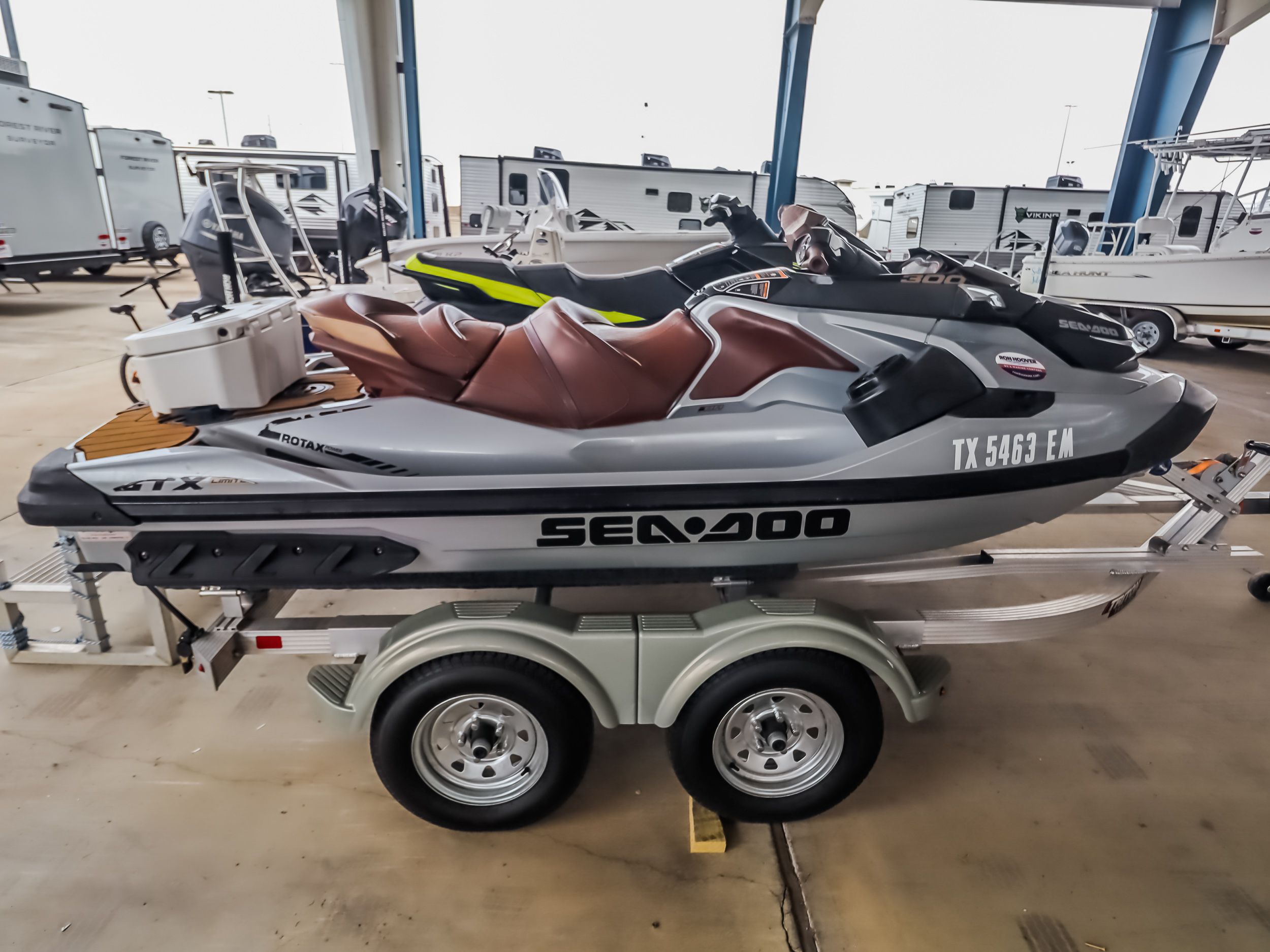 2018 Sea-Doo GTX300 jet ski on trailer in warehouse.