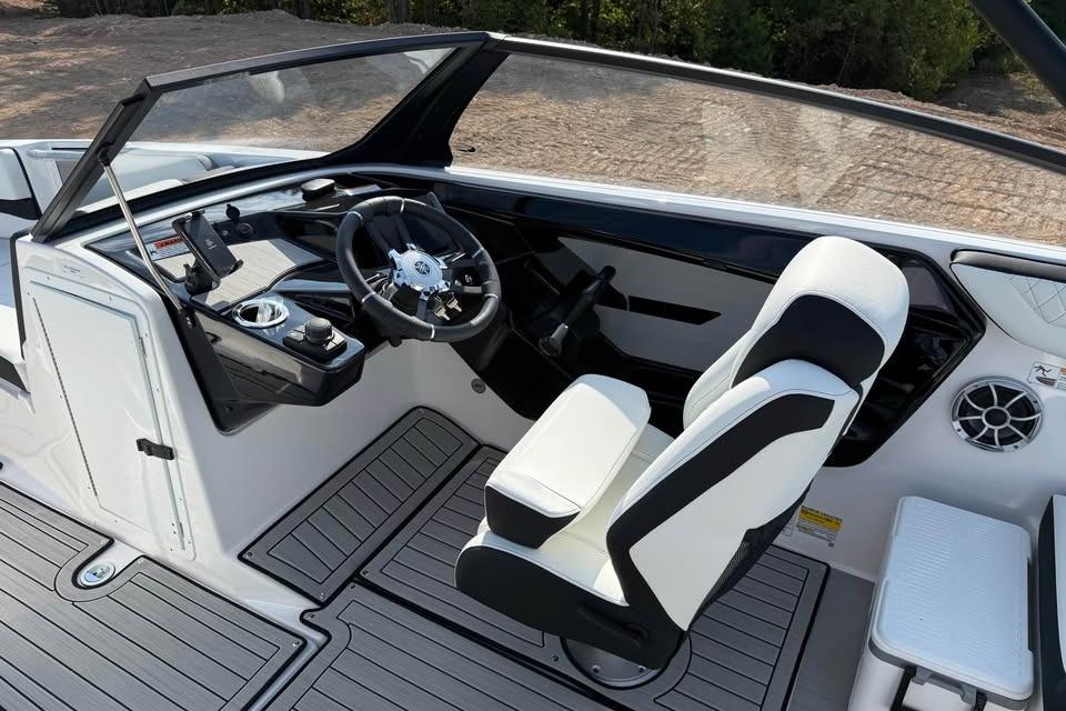 2026 Yamaha Boats 222S cockpit with modern steering and seating design.