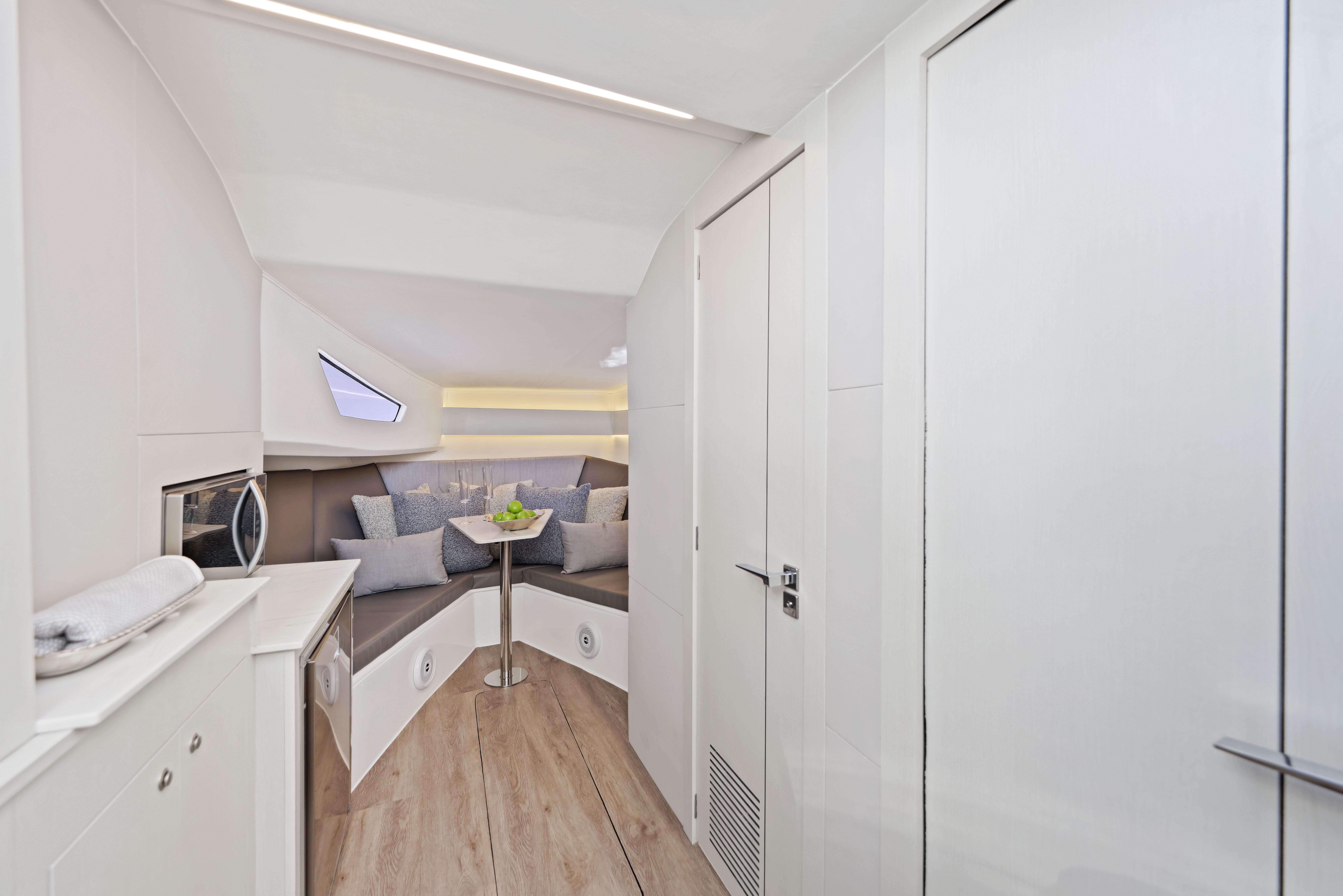 Interior of 2025 Valiatt 380 Bowrider, featuring modern seating and sleek design elements.