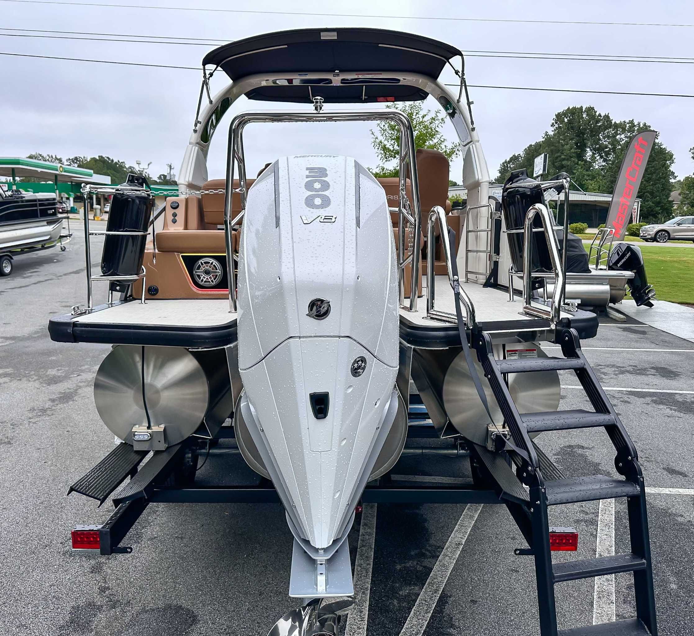 2025 Harris Grand Mariner 230 SLDH with powerful outboard motor.
