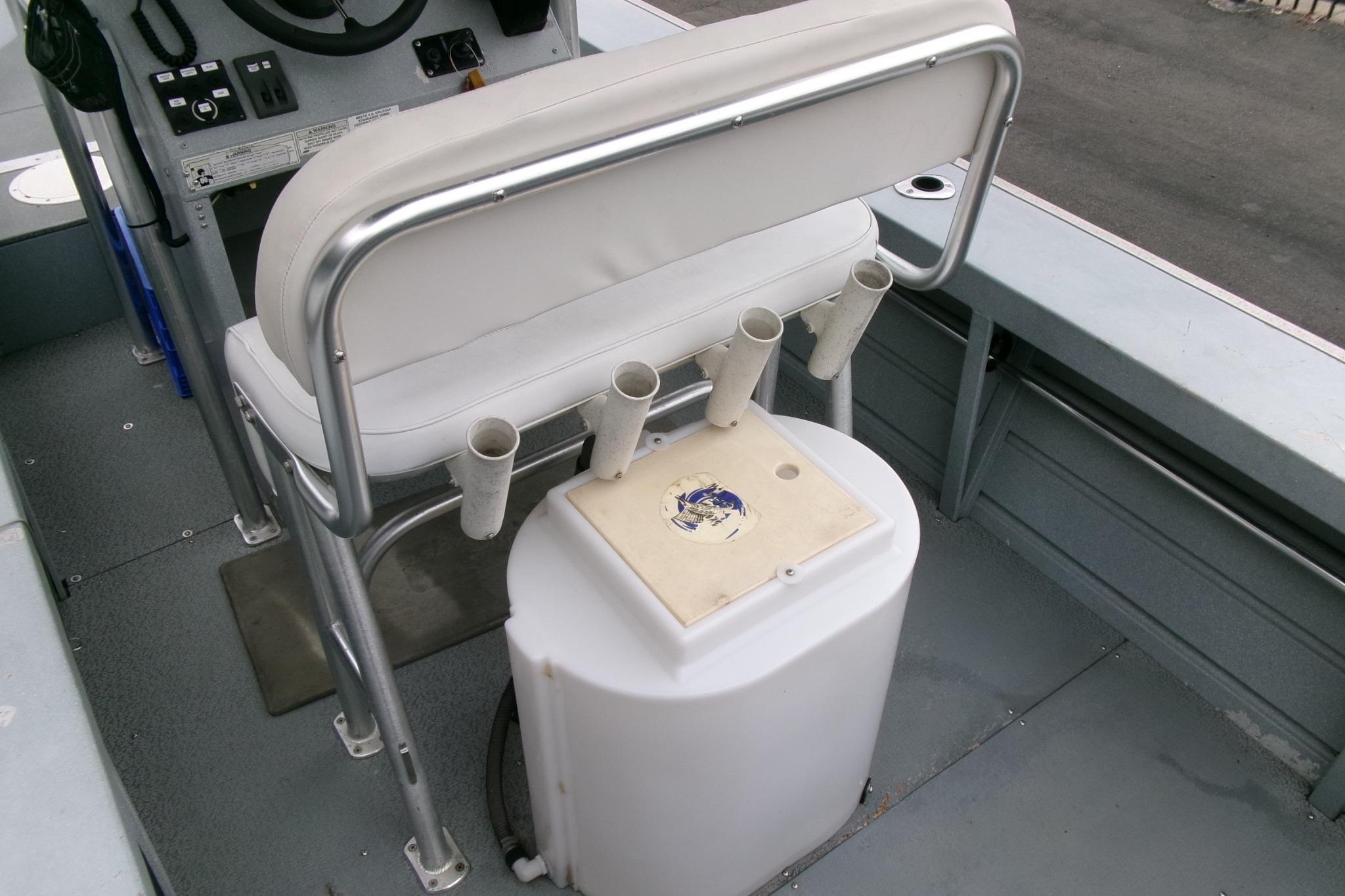 2017 Klamath Bayrunner 19 Baja boat interior with seating and rod holders.
