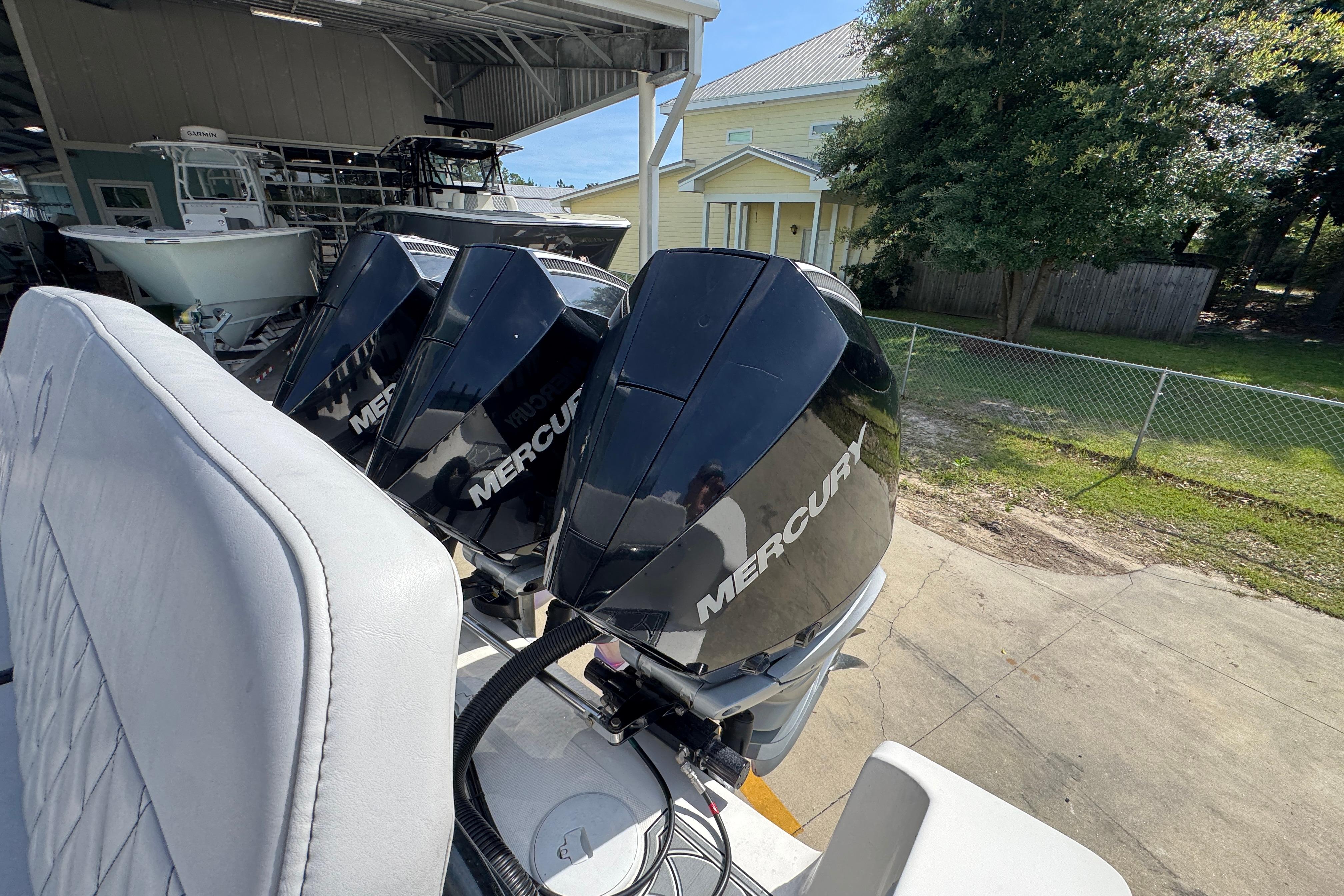 Four Mercury outboard engines on a 2023 Fountain 34 Tournament Edition boat.