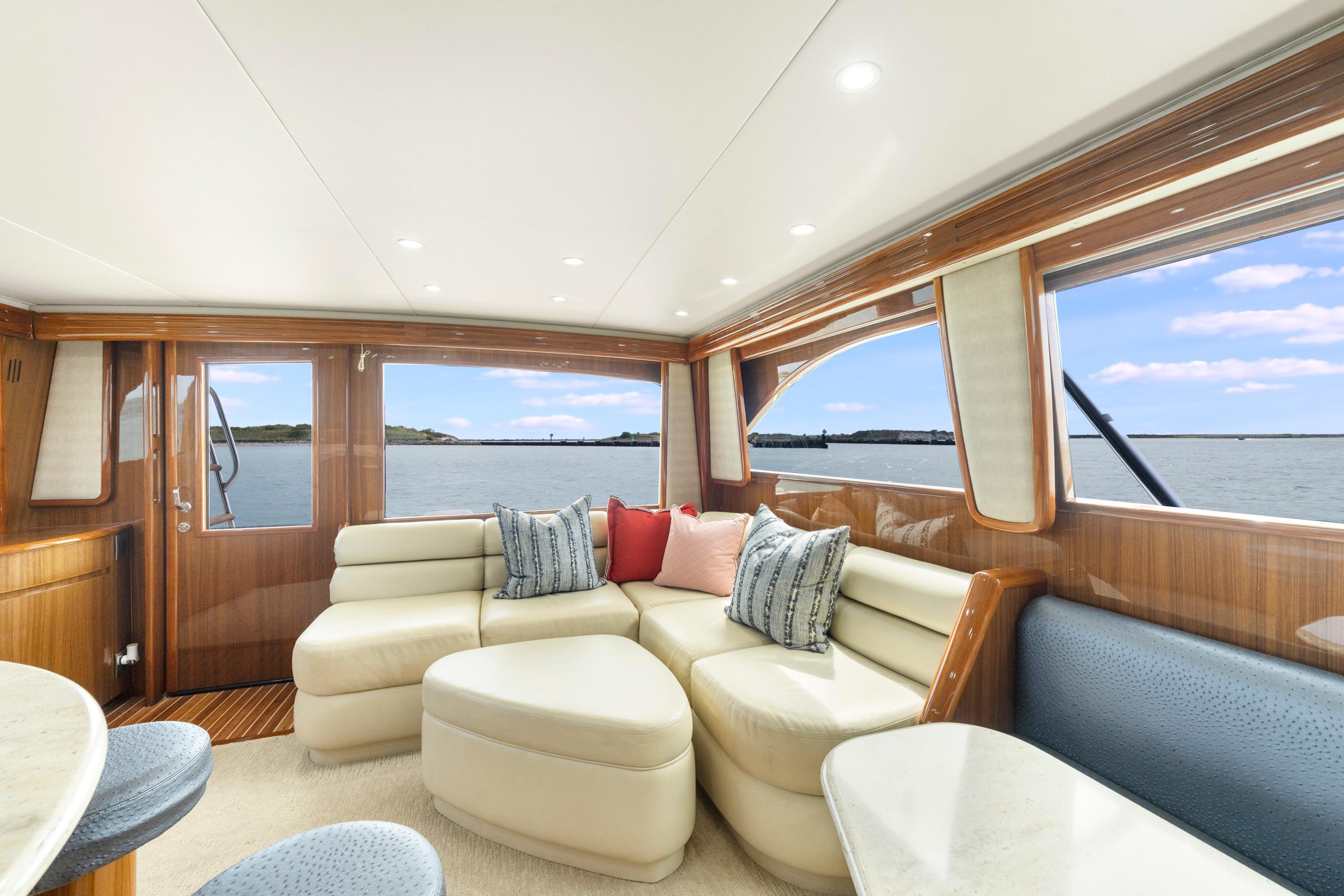 Luxurious interior of 2009 Viking 50 Convertible yacht with scenic ocean view.