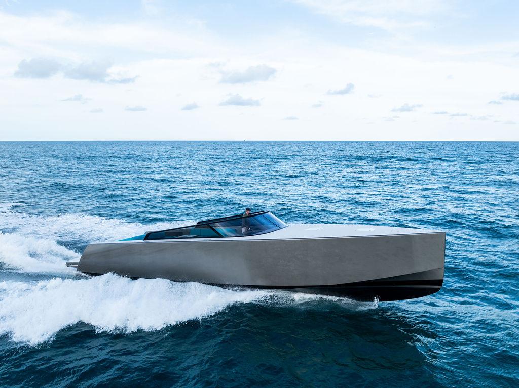 VanDutch 55 yacht cruising on open sea, 2015 model, sleek design, blue sky background.
