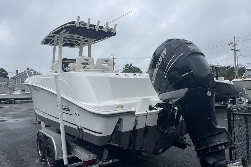 2012 Boston Whaler 250 Outrage boat with Mercury engine on trailer.