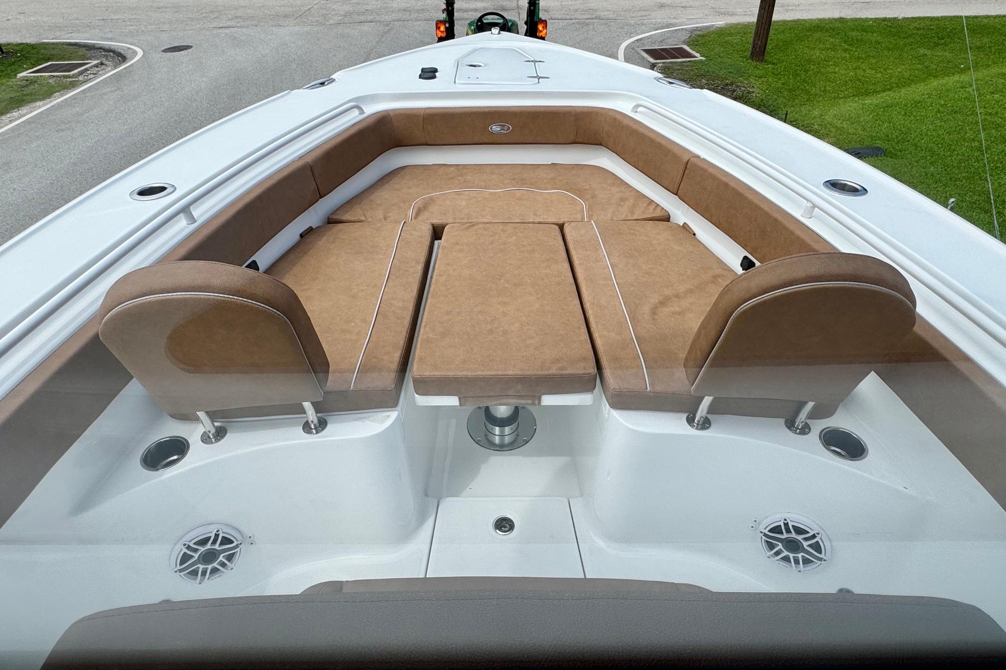 2026 Sea Hunt Ultra 275 SE boat with spacious tan seating and modern design.