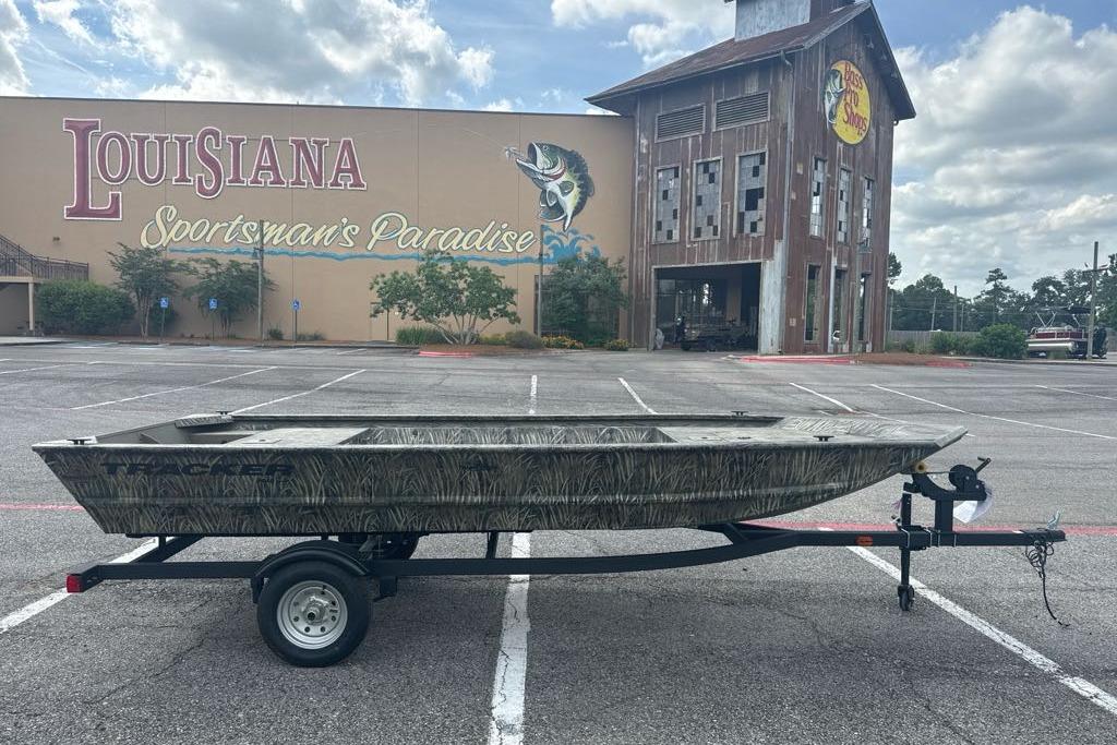 2026 Tracker Grizzly 1648 Utility boat on trailer, parked at Louisiana Sportsman's Paradise.