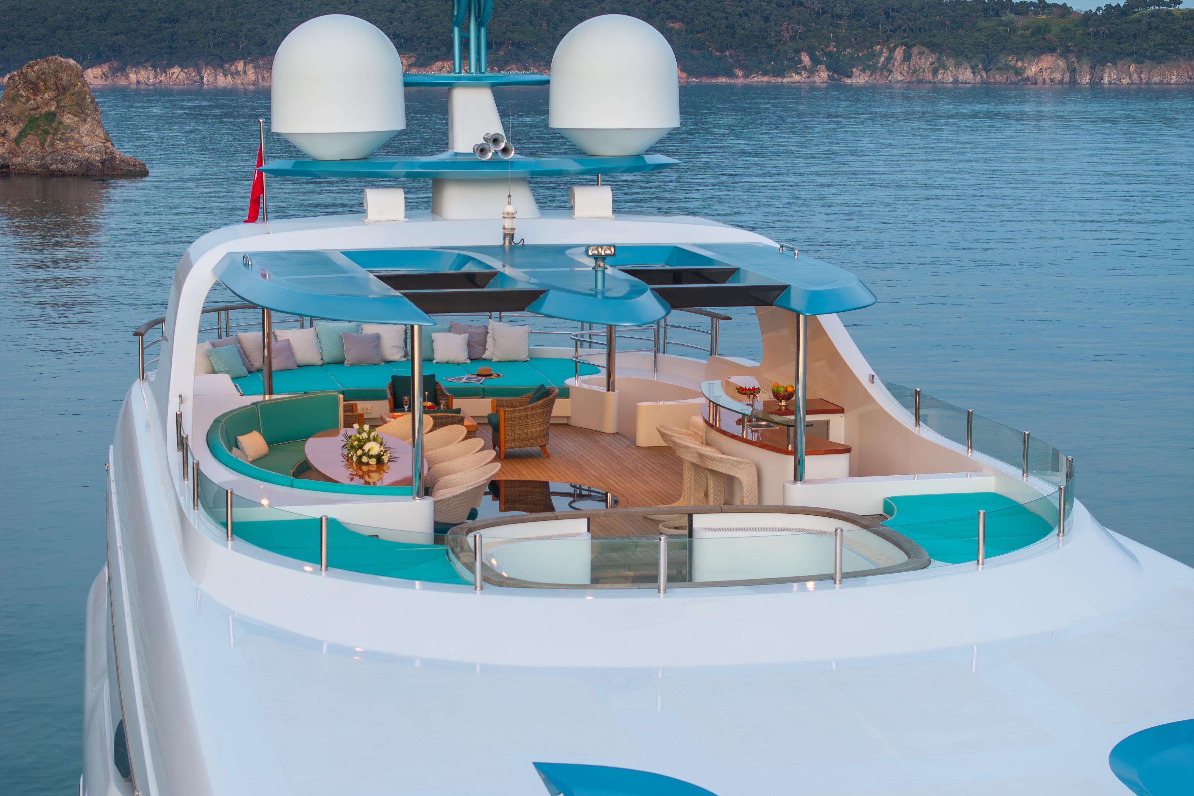 Luxurious Bilgin 147 yacht deck with seating and ocean view, 2014 model.